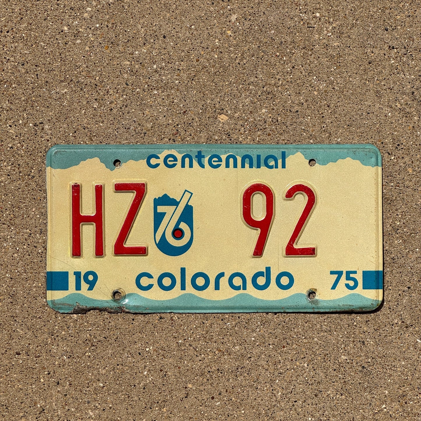 Photo of a 1975 Colorado License Plate Auto Tag Garage Decor Vintage Centennial HZ 92