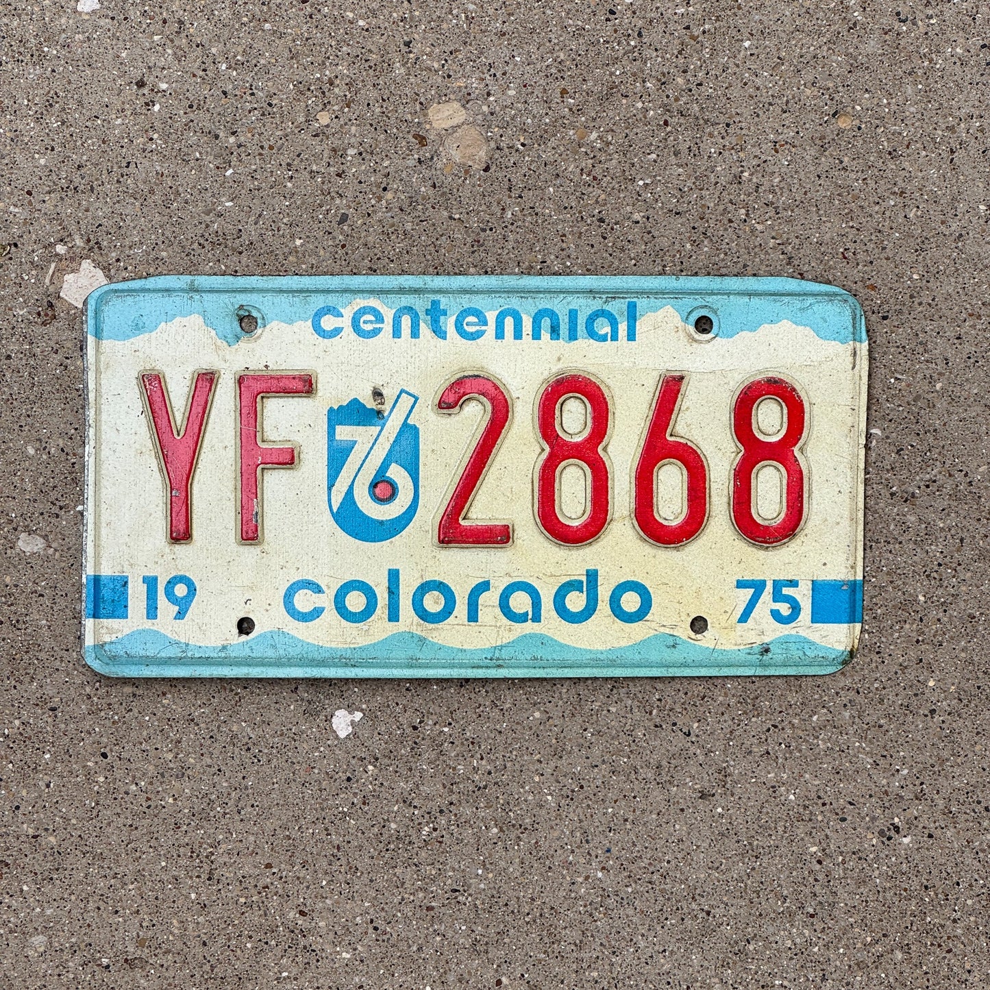 Photo of a 1975 Colorado License Plate Auto Tag Garage Decor Vintage YF 2868