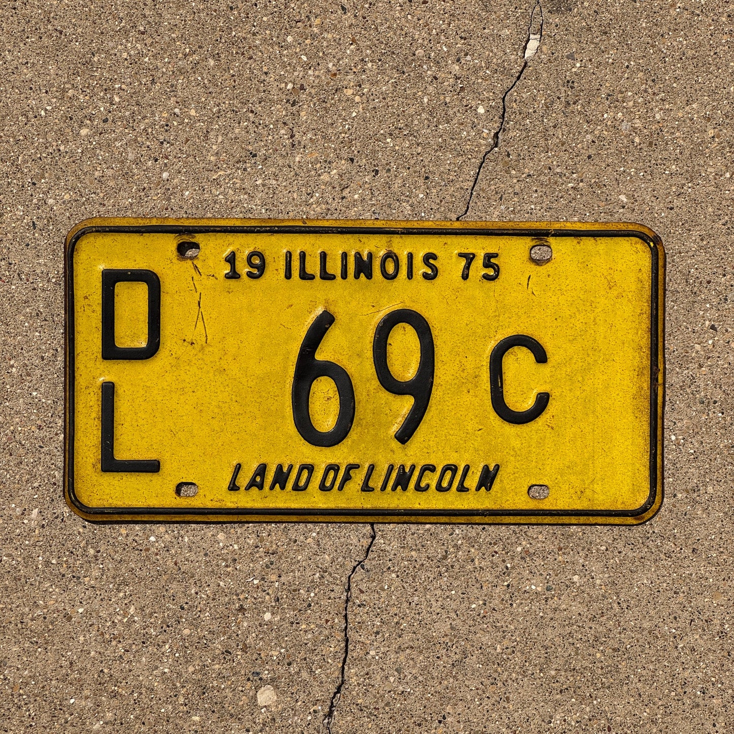 Photo of a 1975 Illinois Dealer License Plate Auto Tag Garage Decor Vintage 69 C