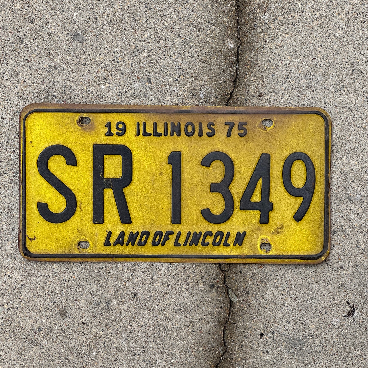 Photo of a 1975 Illinois License Plate Auto Tag 1 Vintage Garage SR 1349 with original patina