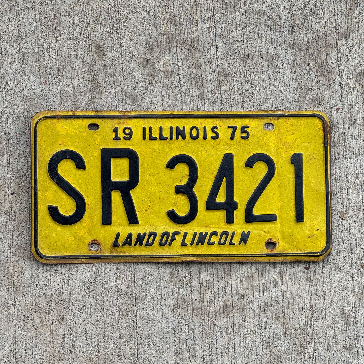 Photo of a 1975 Illinois License Plate Auto Tag 1 Vintage Garage SR 3421 with original patina