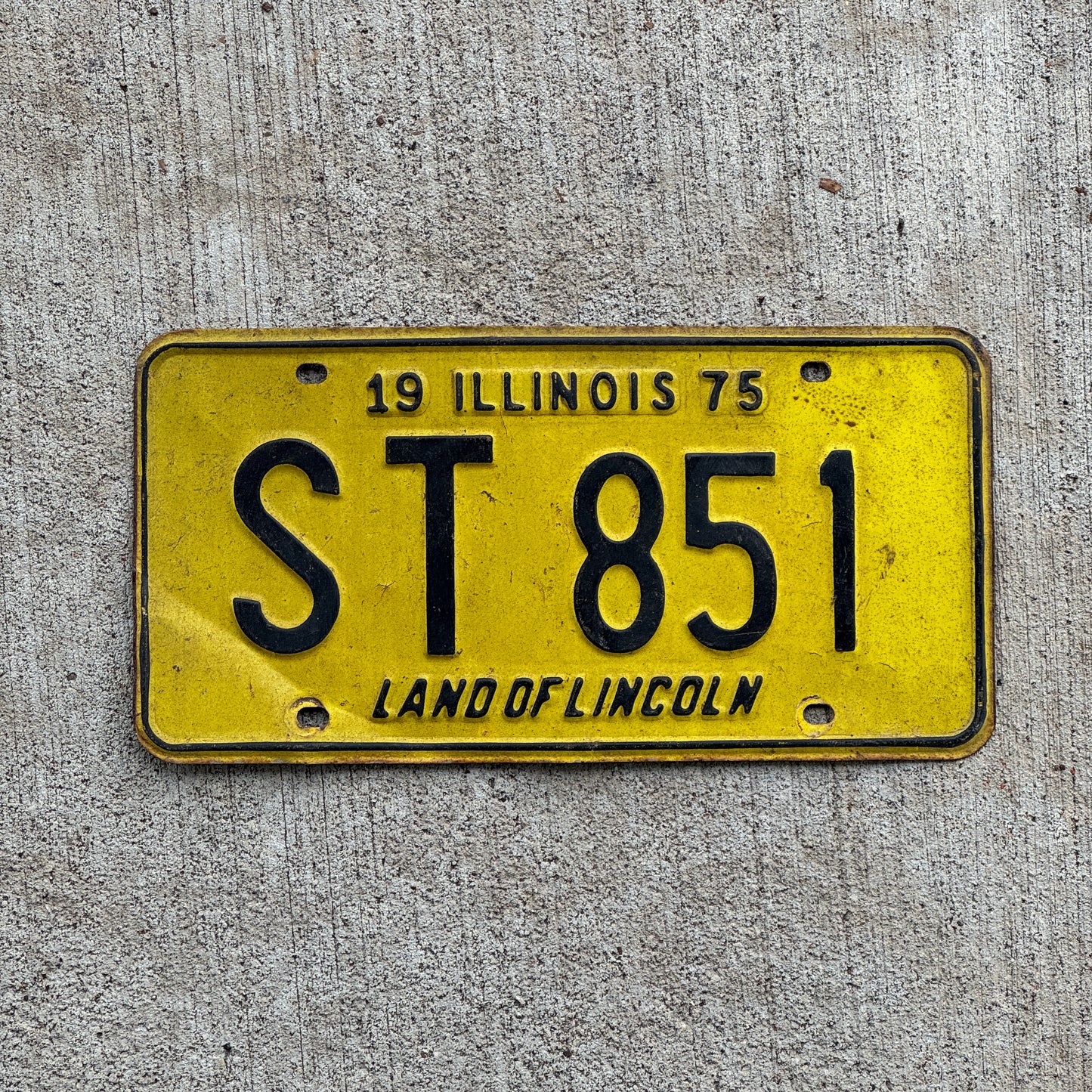 Photo of a 1975 Illinois License Plate Auto Tag 2 Vintage Garage ST 851 with original patina