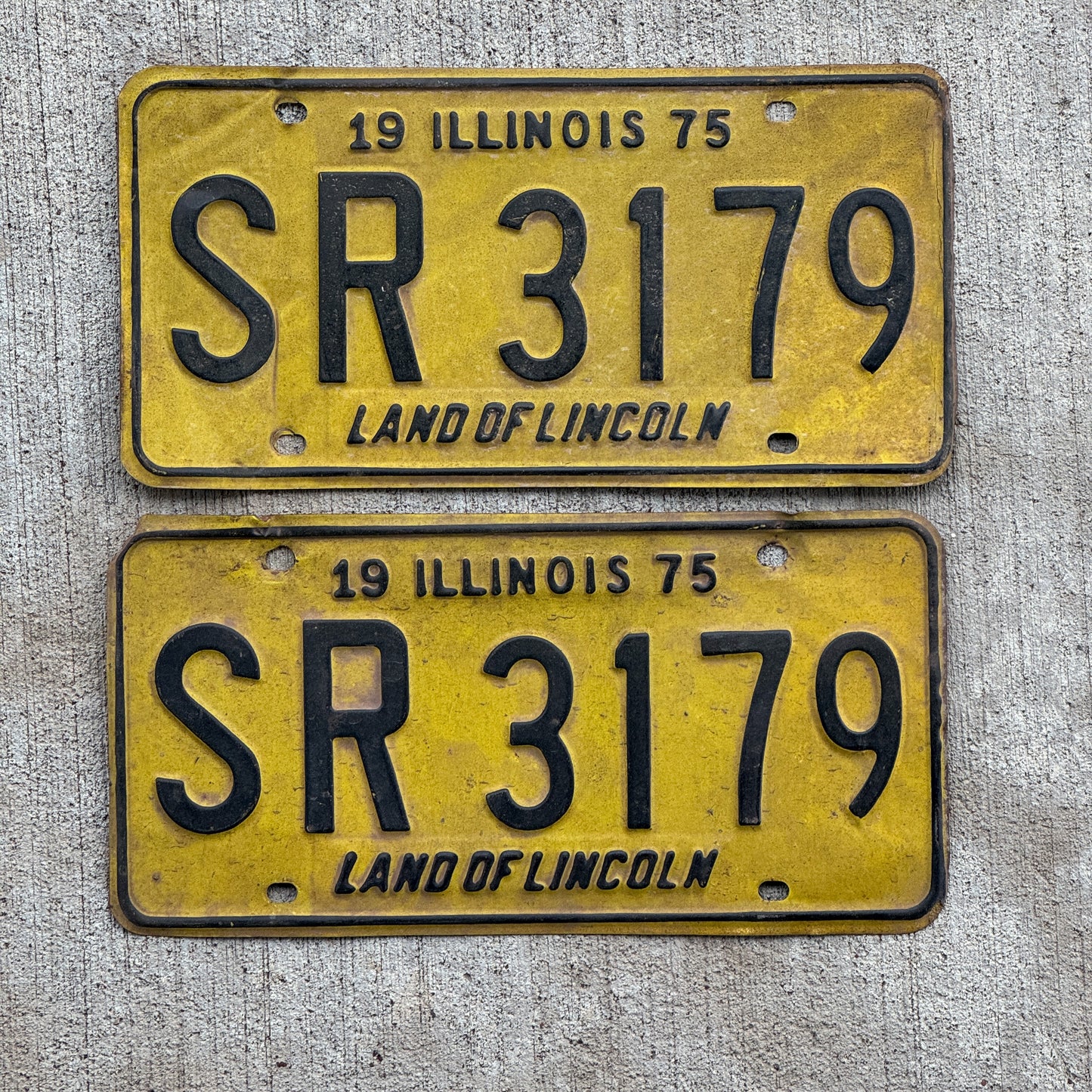 Photo of a 1975 Illinois License Plate Pair Auto Tag Garage Decor Vintage SR 3179 with original patina