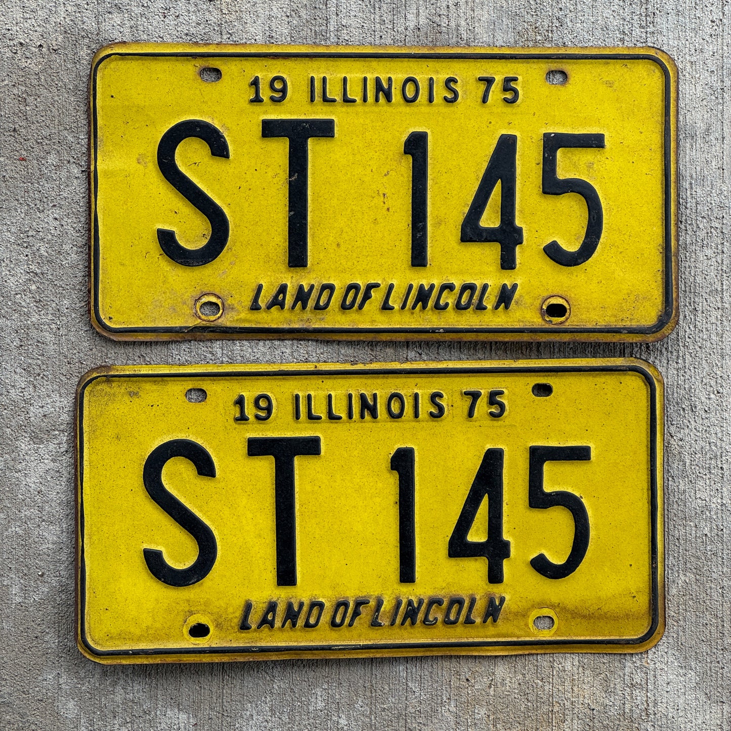 Photo of a 1975 Illinois License Plate Pair Auto Tag Garage Decor Vintage ST 145 with original patina