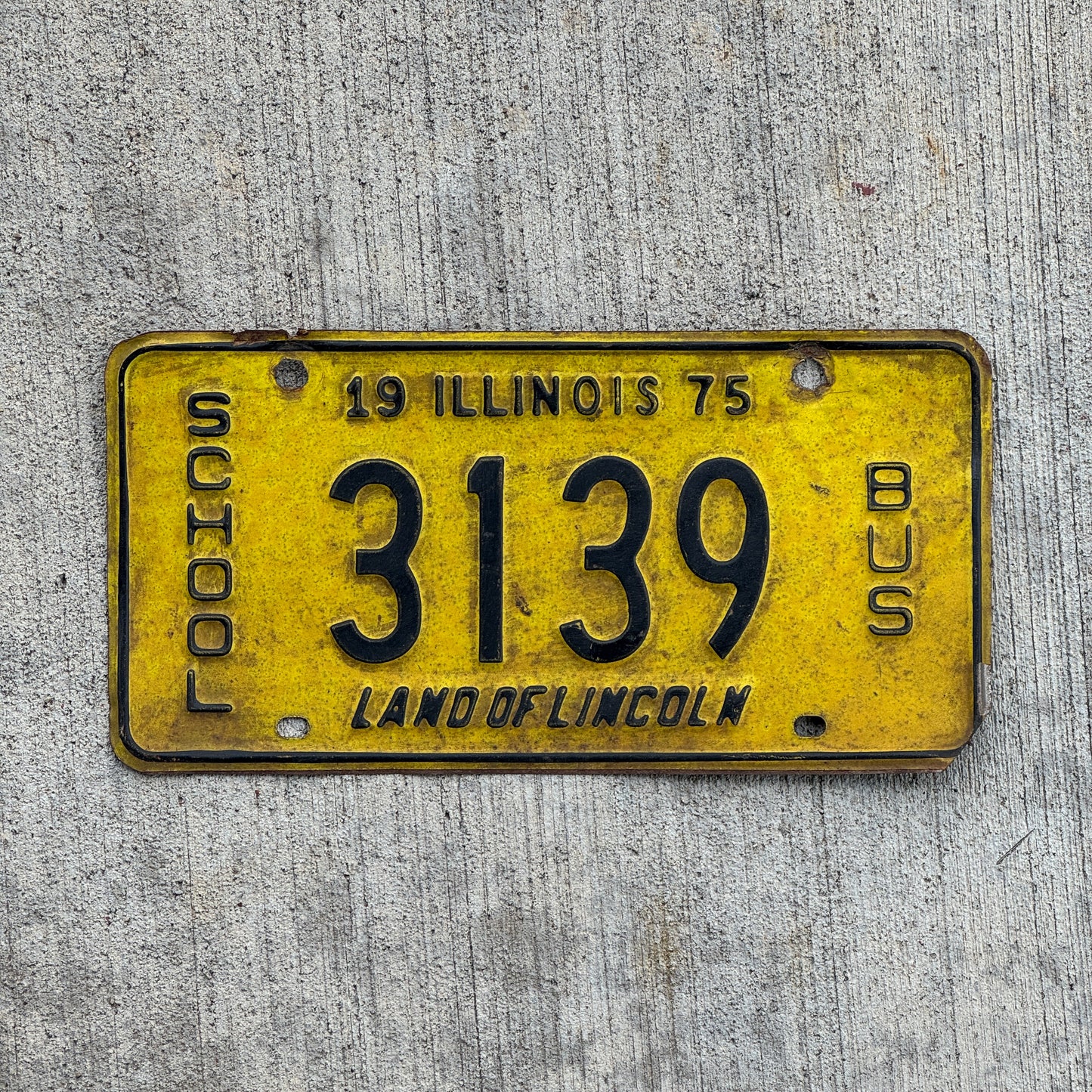 Photo of a 1975 Illinois School Bus License Plate Auto Tag Garage Decor Vintage 3139 with original patina