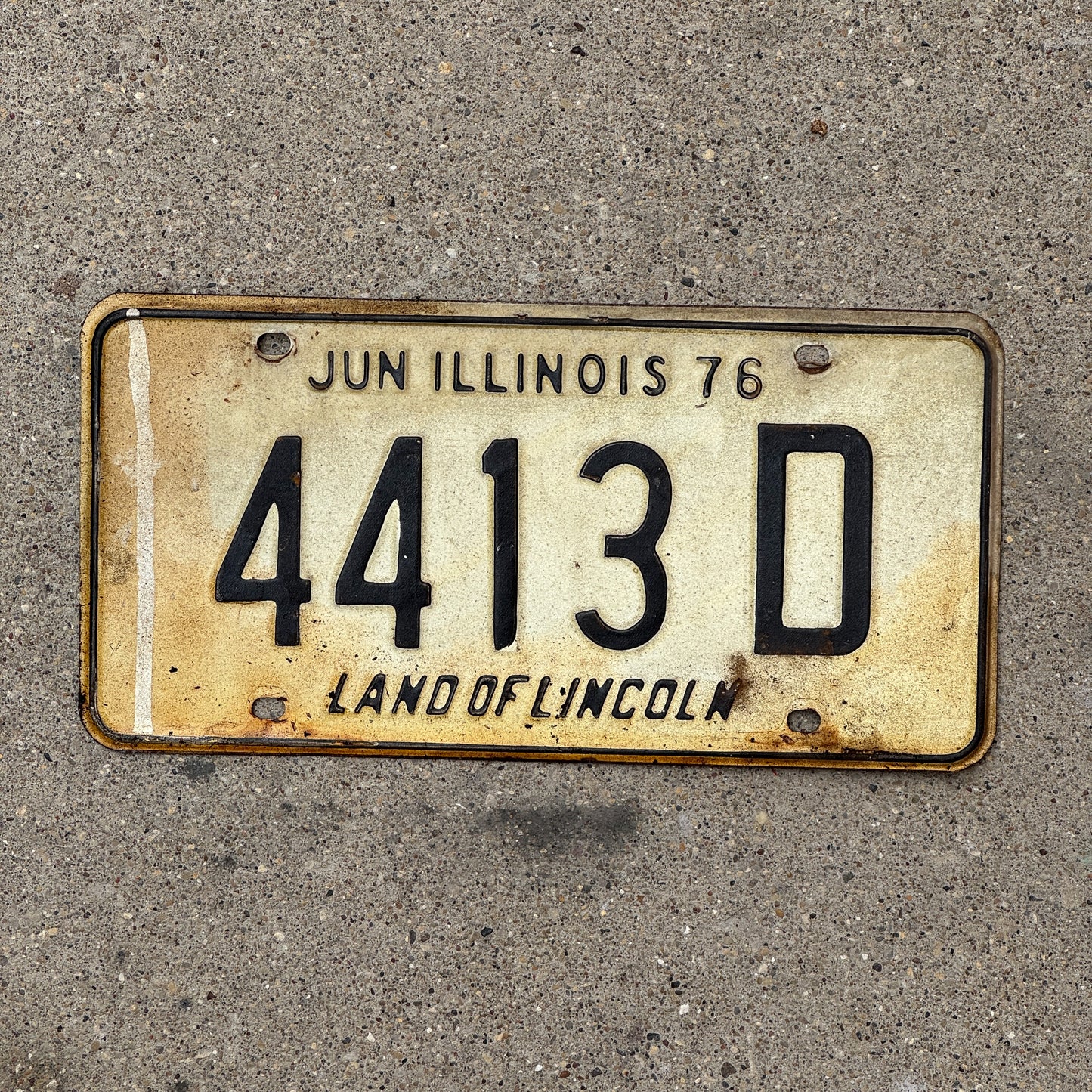 Photo of a 1975 Illinois Truck License Plate Auto Tag Garage Decor Vintage 4413 D with original patina