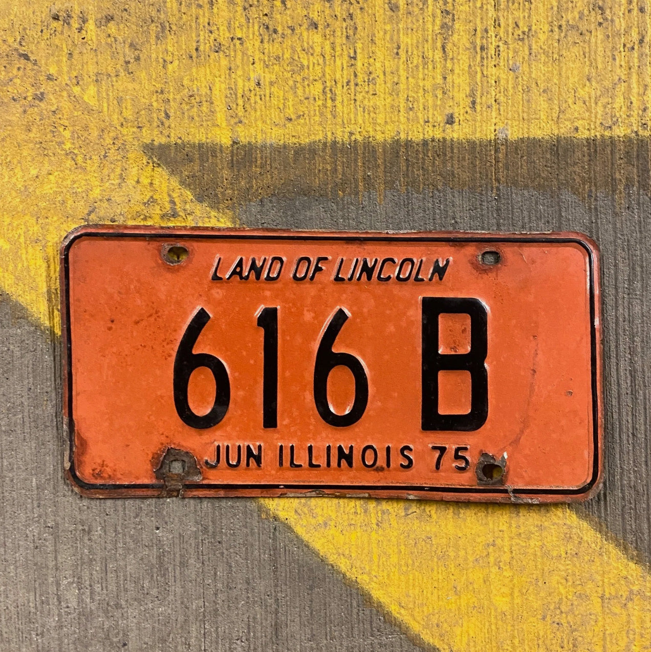 Photo of a 1975 Illinois Truck License Plate Auto Tag Garage Decor Vintage 616 B with original patina