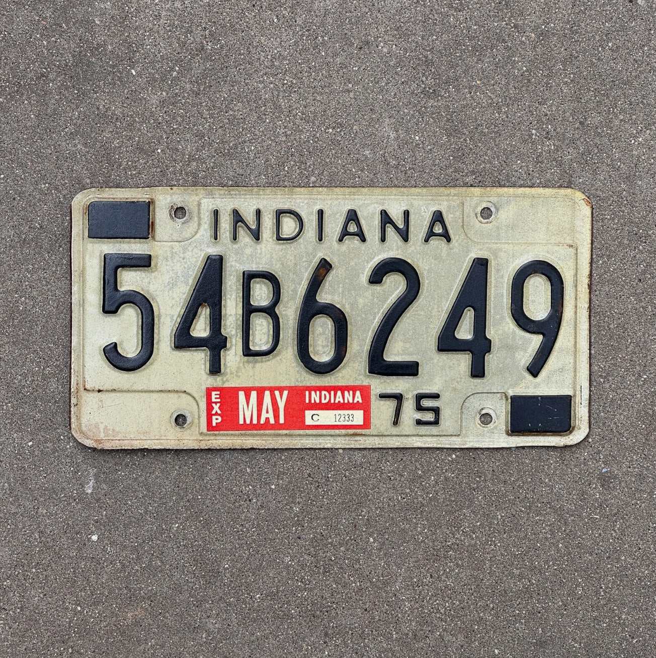 Photo of a 1975 Indiana License Plate Auto Tag Garage Decor 54 B 6249