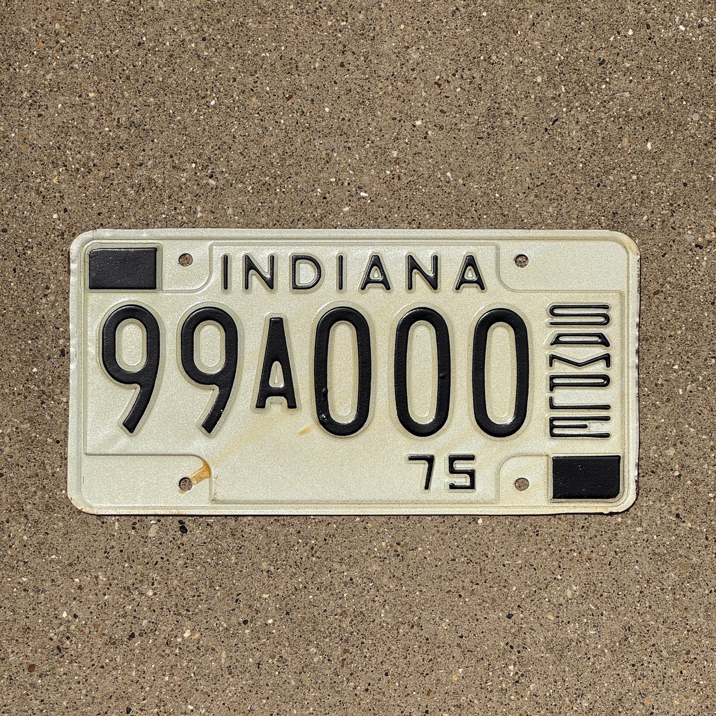 Photo of a 1975 Indiana Sample License Plate Auto Tag Garage Decor Vintage 99 A 000