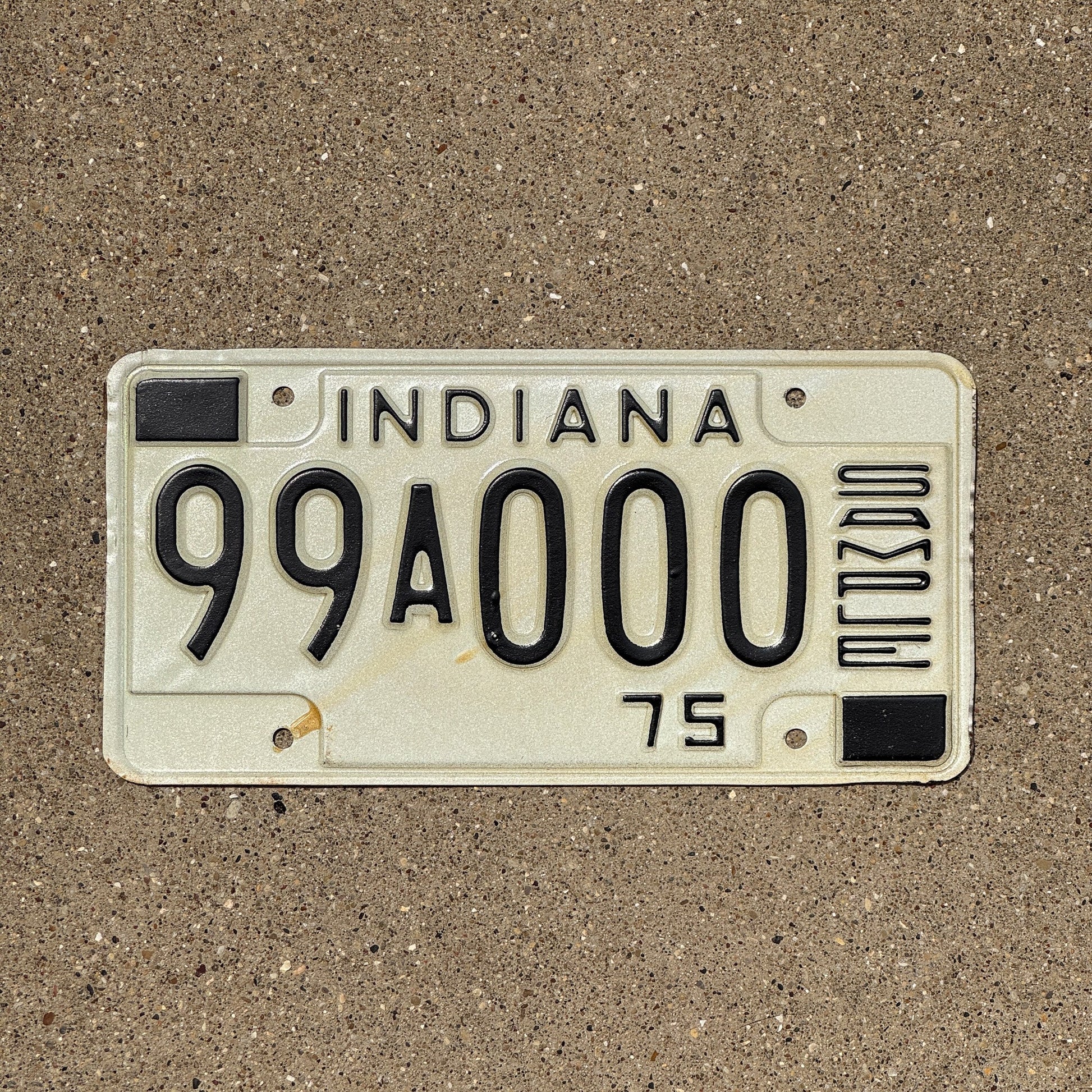 Photo of a 1975 Indiana Sample License Plate Auto Tag Garage Decor Vintage 99 A 000