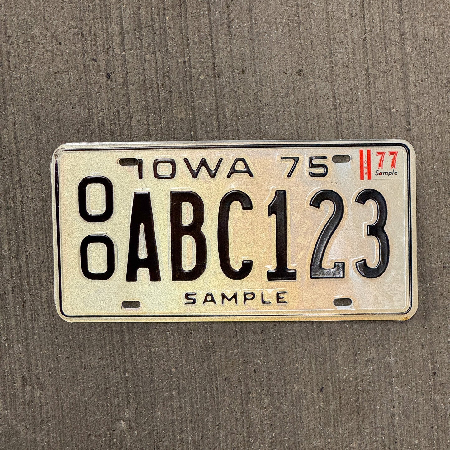 Photo of a 1975 Iowa SAMPLE License Plate Auto Tag Garage Decor Vintage 00 ABC 123