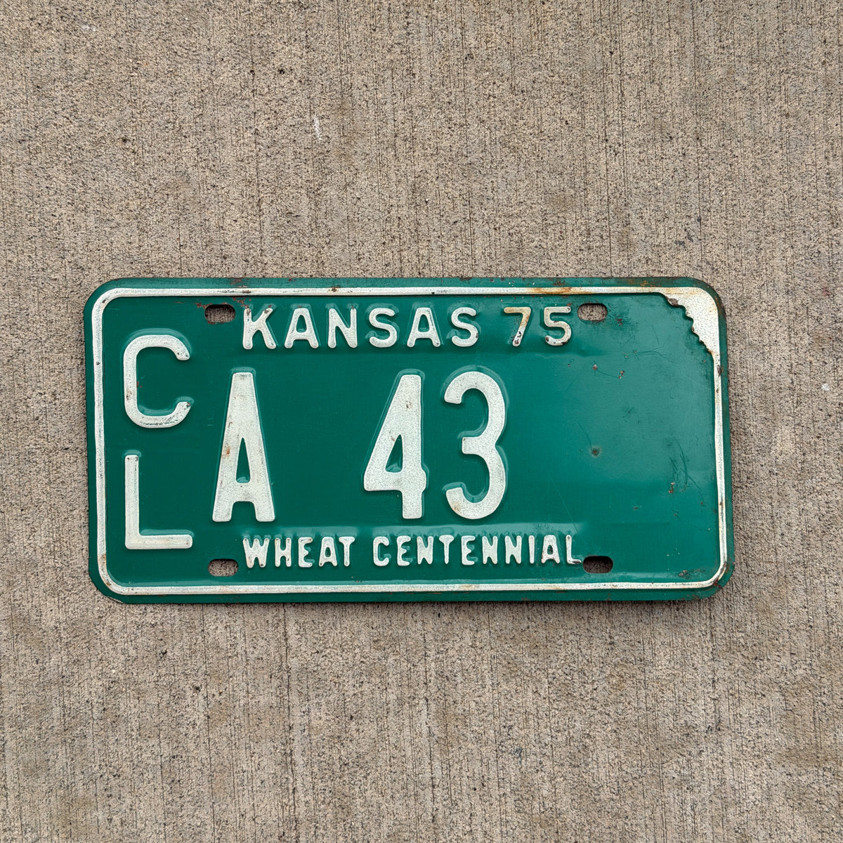 Photo of a 1975 Kansas License Plate Auto Tag Garage Decor Vintage CL A 43 with original patina
