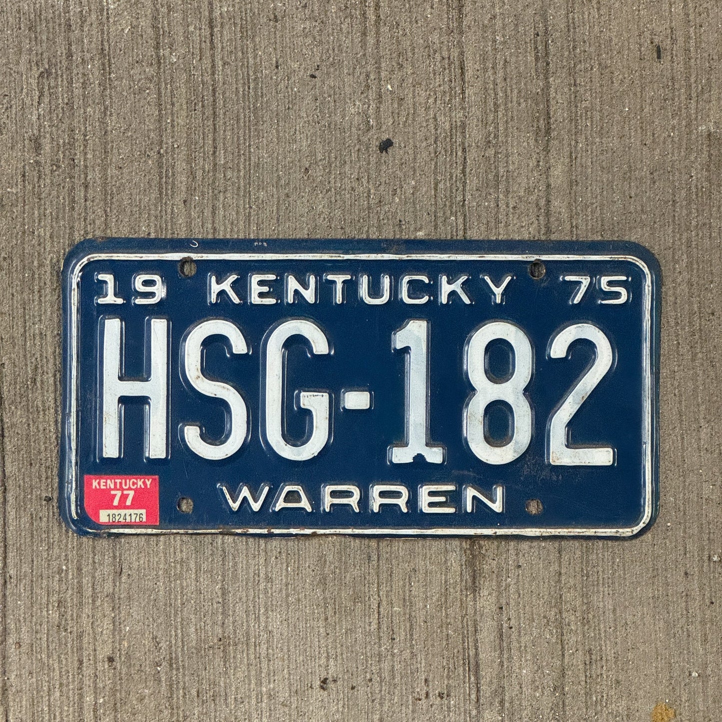Photo of a 1975 Kentucky License Plate Auto Tag Garage Decor Vintage Warren County HSG 182