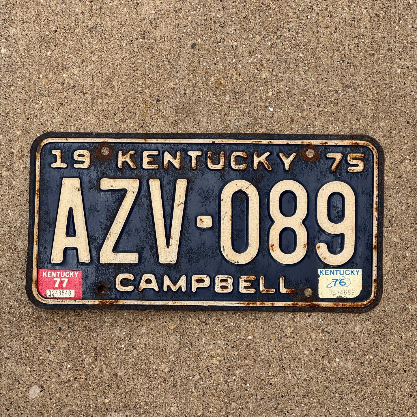Photo of a 1975 Kentucky License Plate Auto Tag Garage Decor Vintage AZV 089