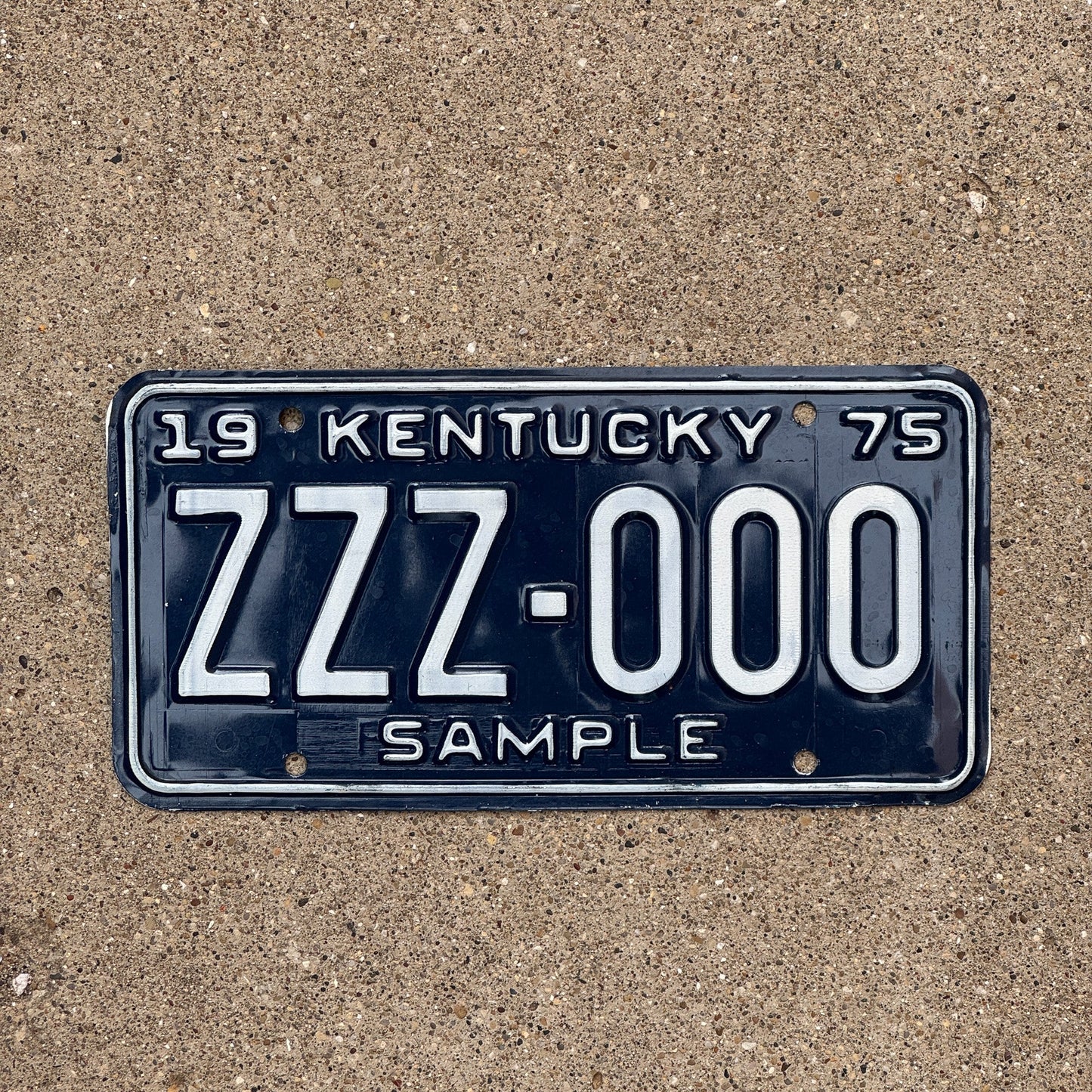 Photo of a 1975 Kentucky SAMPLE License Plate Auto Tag Garage Decor Vintage ZZZ 000