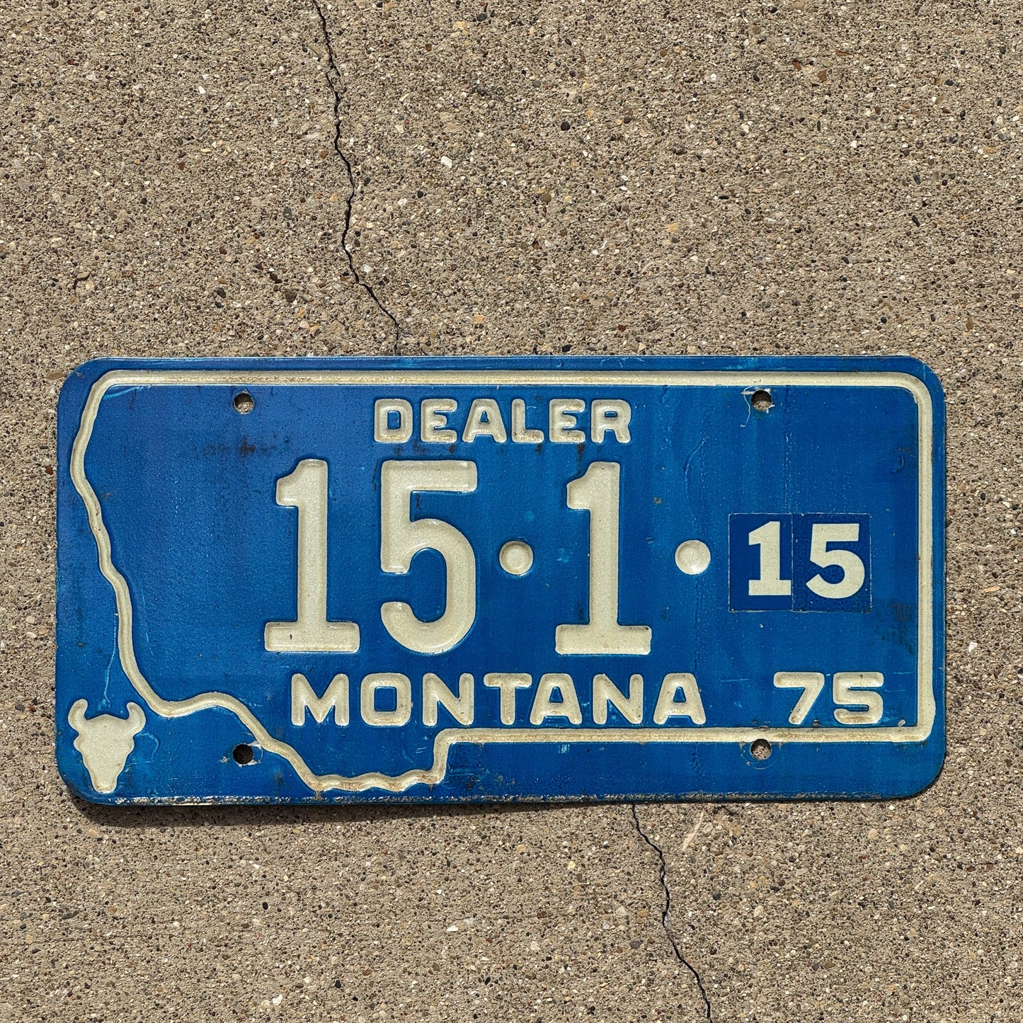 Photo of a 1975 Montana Dealer License Plate Auto Tag Garage Decor Vintage 15 1 15