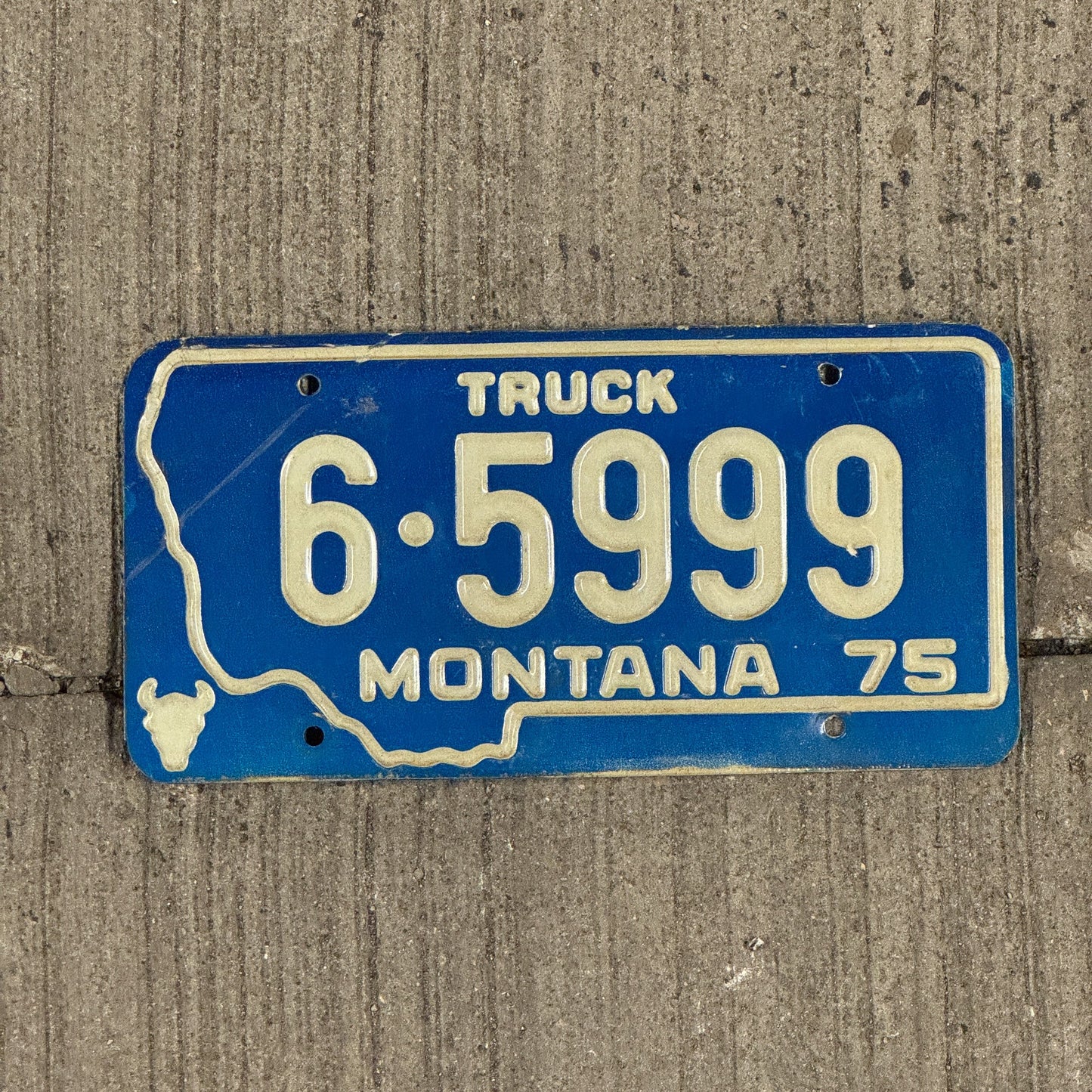 Photo of a 1975 Montana License Plate Auto Tag Garage Decor Vintage Repeat Repeating 6 5 999