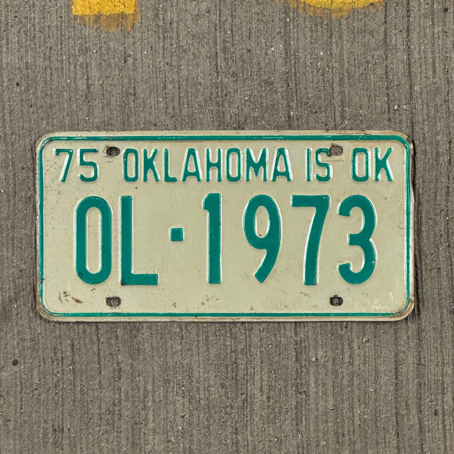 Photo of a 1975 Oklahoma License Plate Auto Tag Garage Decor Vintage Classic Car OL 1973