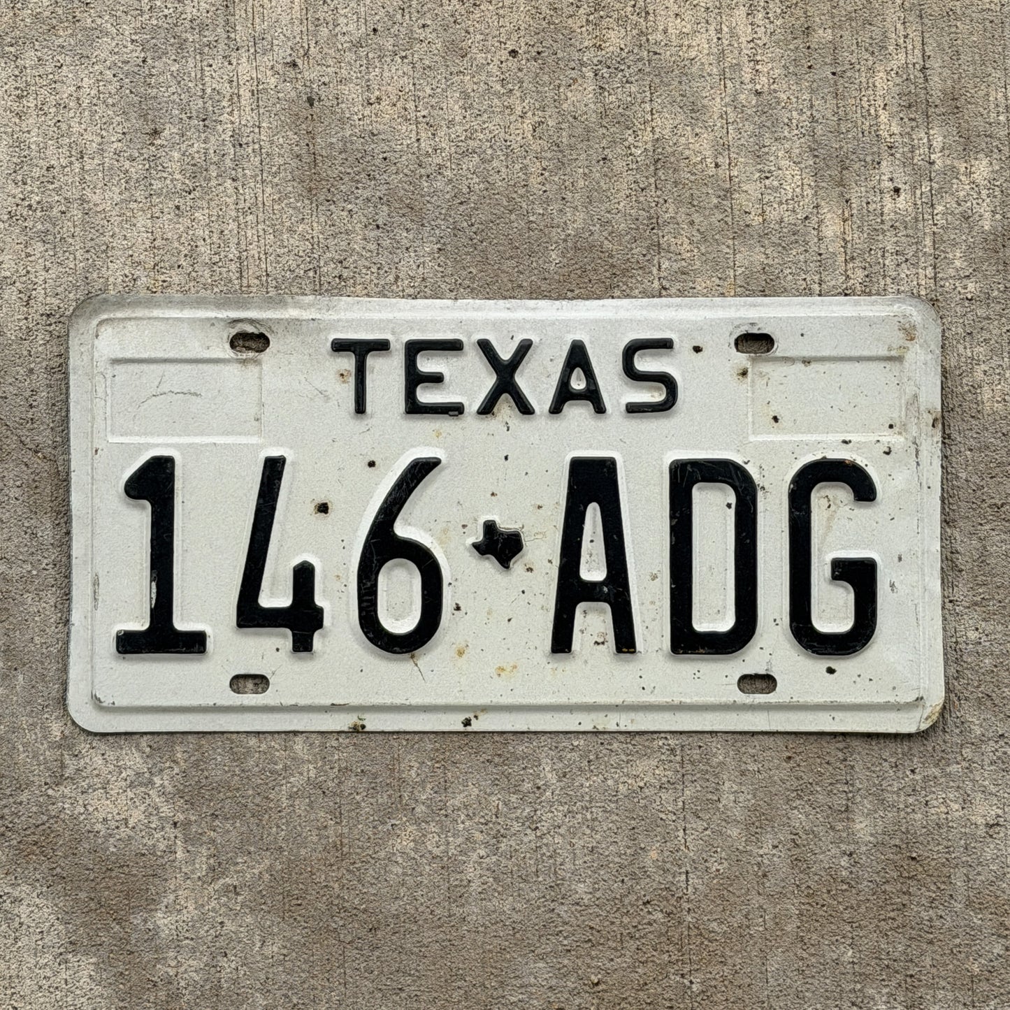 Photo of a 1975 Texas License Plate Auto Tag Garage Decor Vintage 146 ADG with original patina