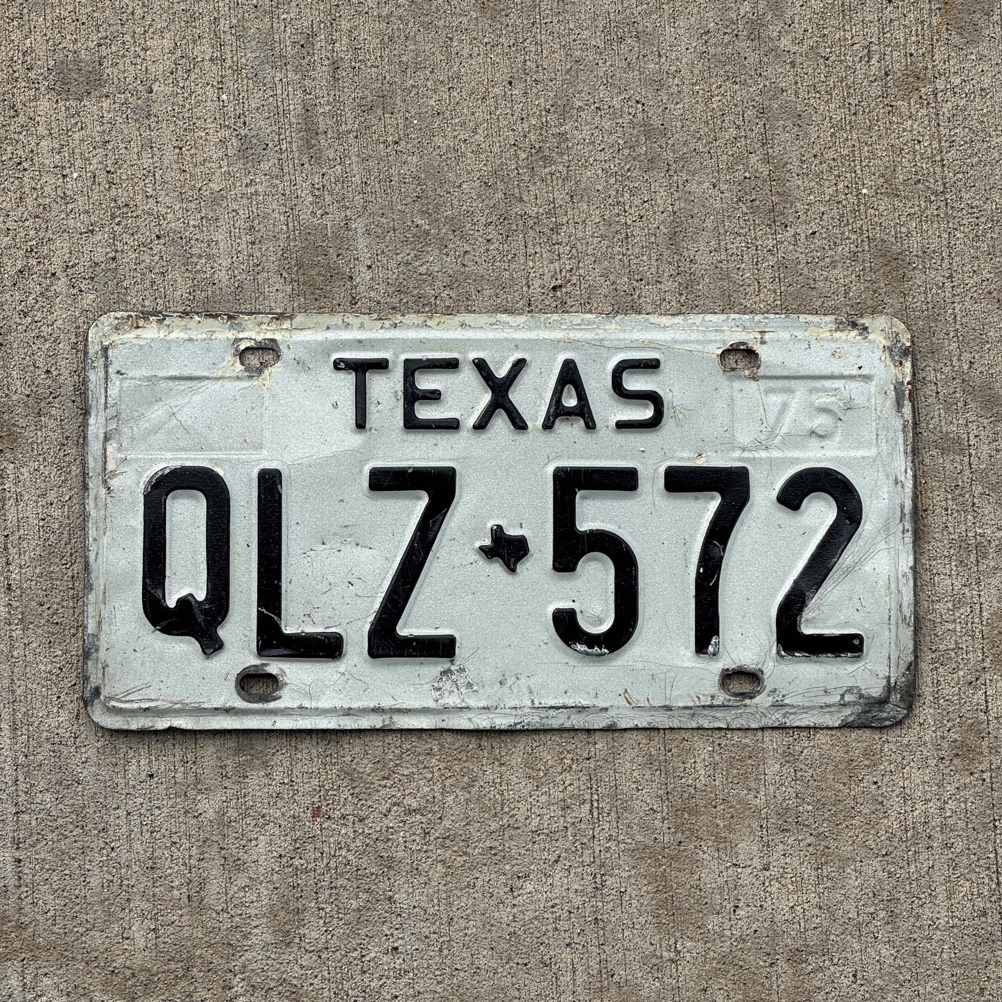 Photo of a 1975 Texas License Plate Auto Tag Garage Decor Vintage QLZ 572 with original patina