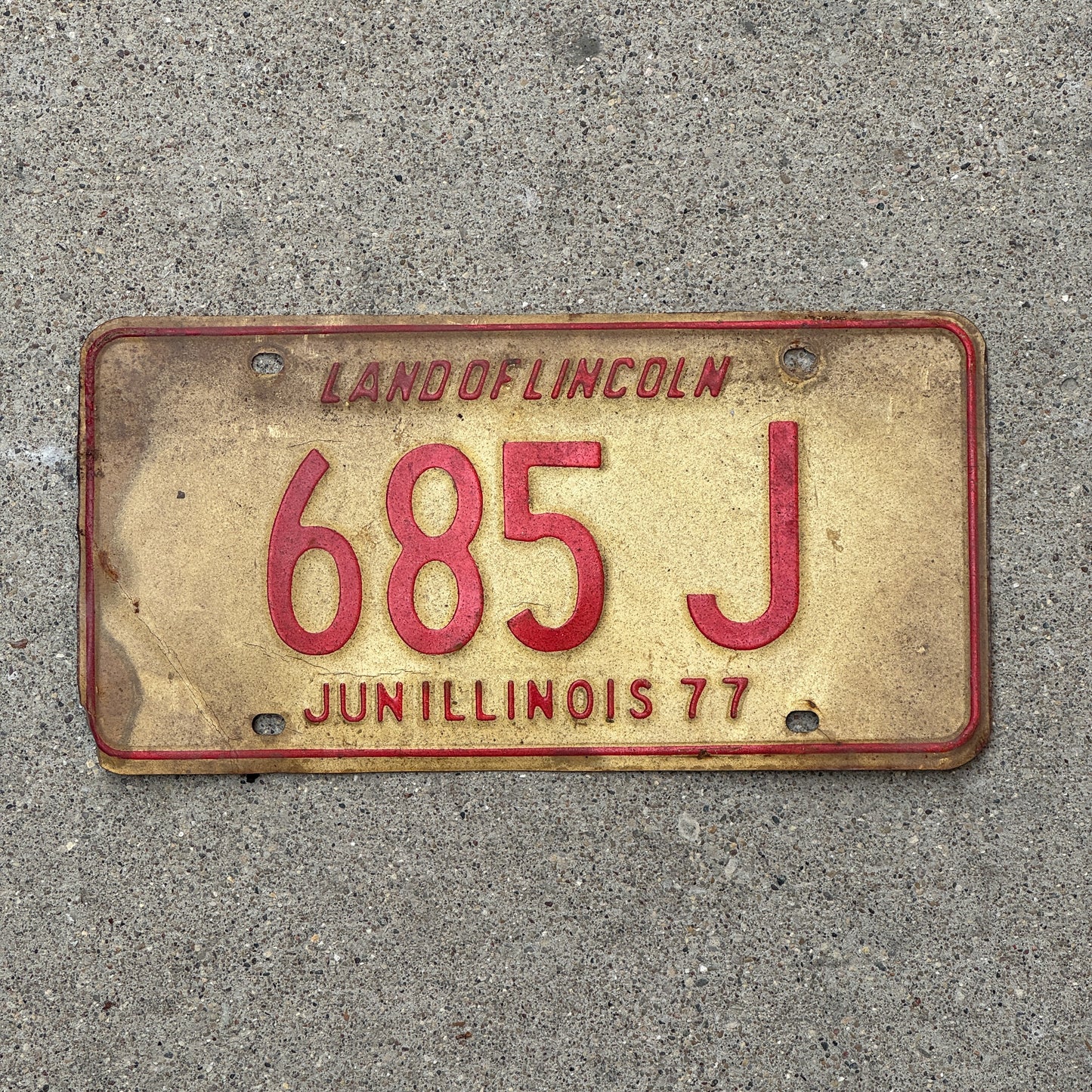 Photo of a 1976 1977 Illinois Truck License Plate Auto Tag Garage Decor Vintage Low Number Three Digit 685 J with original patina