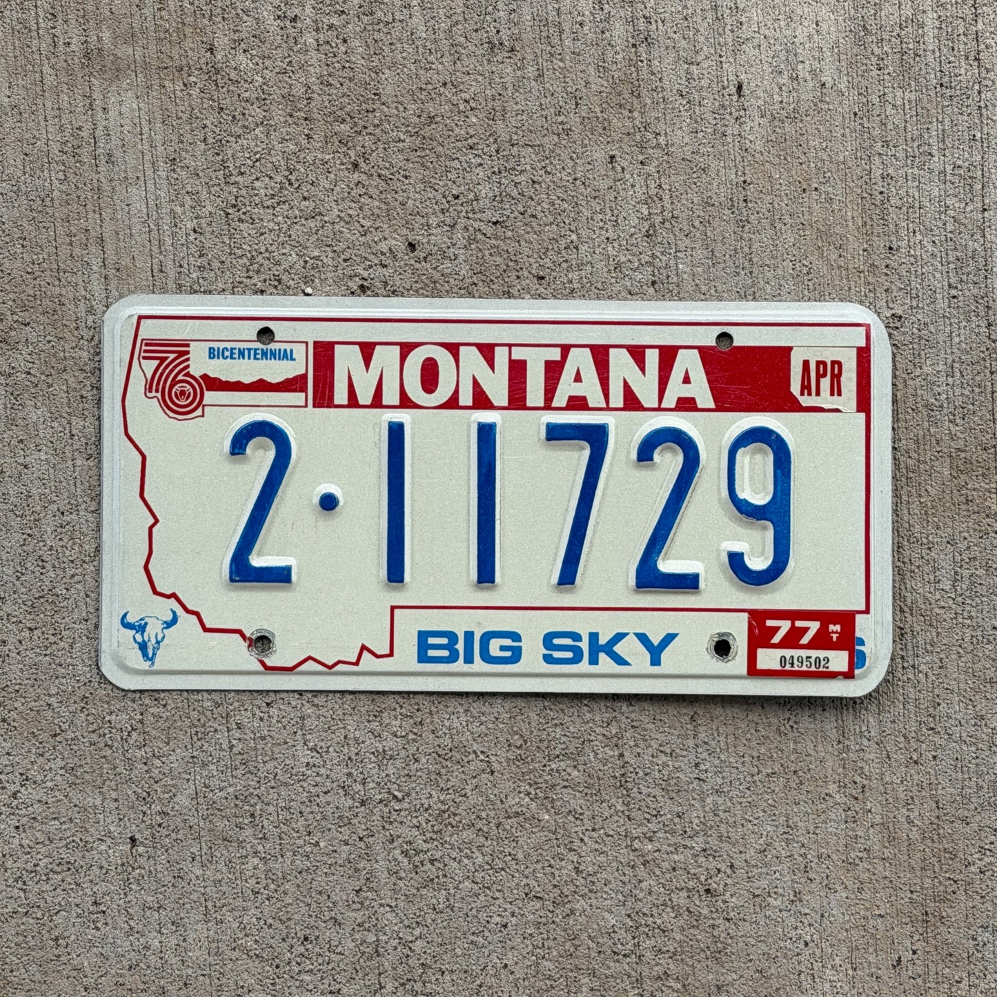 Photo of a 1976 1977 Montana License Plate Auto Tag 1 Vintage Garage Bicentennial 2 11729 with original patina