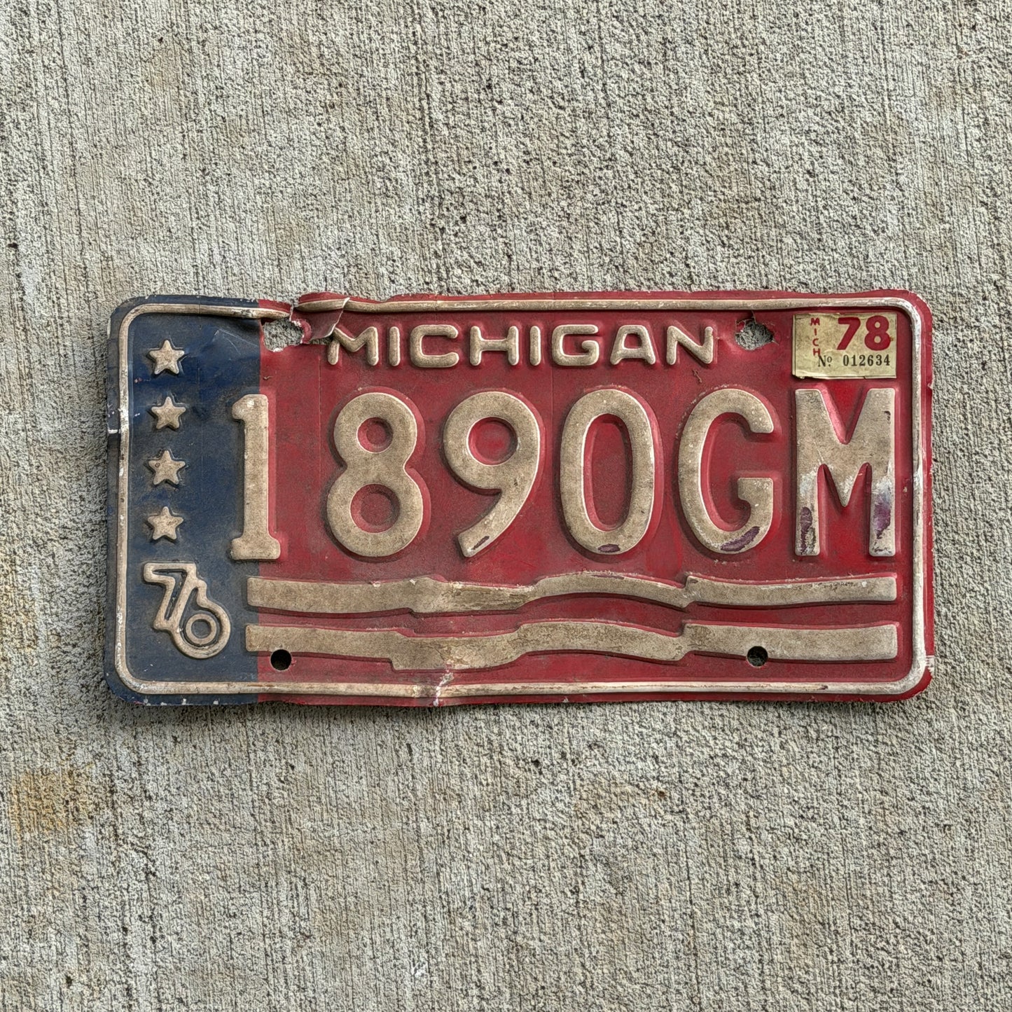Photo of a 1976 1978 Michigan Commercial License Plate Auto Tag Garage Decor Vintage Bicentennial 1890 GM with original patina