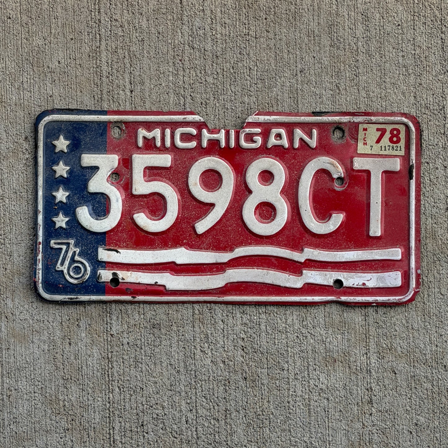 Photo of a 1976 1978 Michigan Commercial License Plate Auto Tag Garage Decor Vintage Bicentennial 3598 CT with original patina