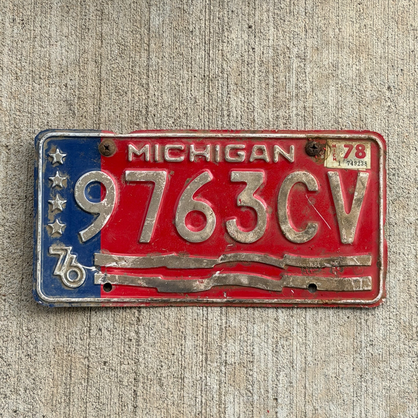 Photo of a 1976 1978 Michigan Commercial License Plate Auto Tag Garage Decor Vintage Bicentennial 9763 CV with original patina