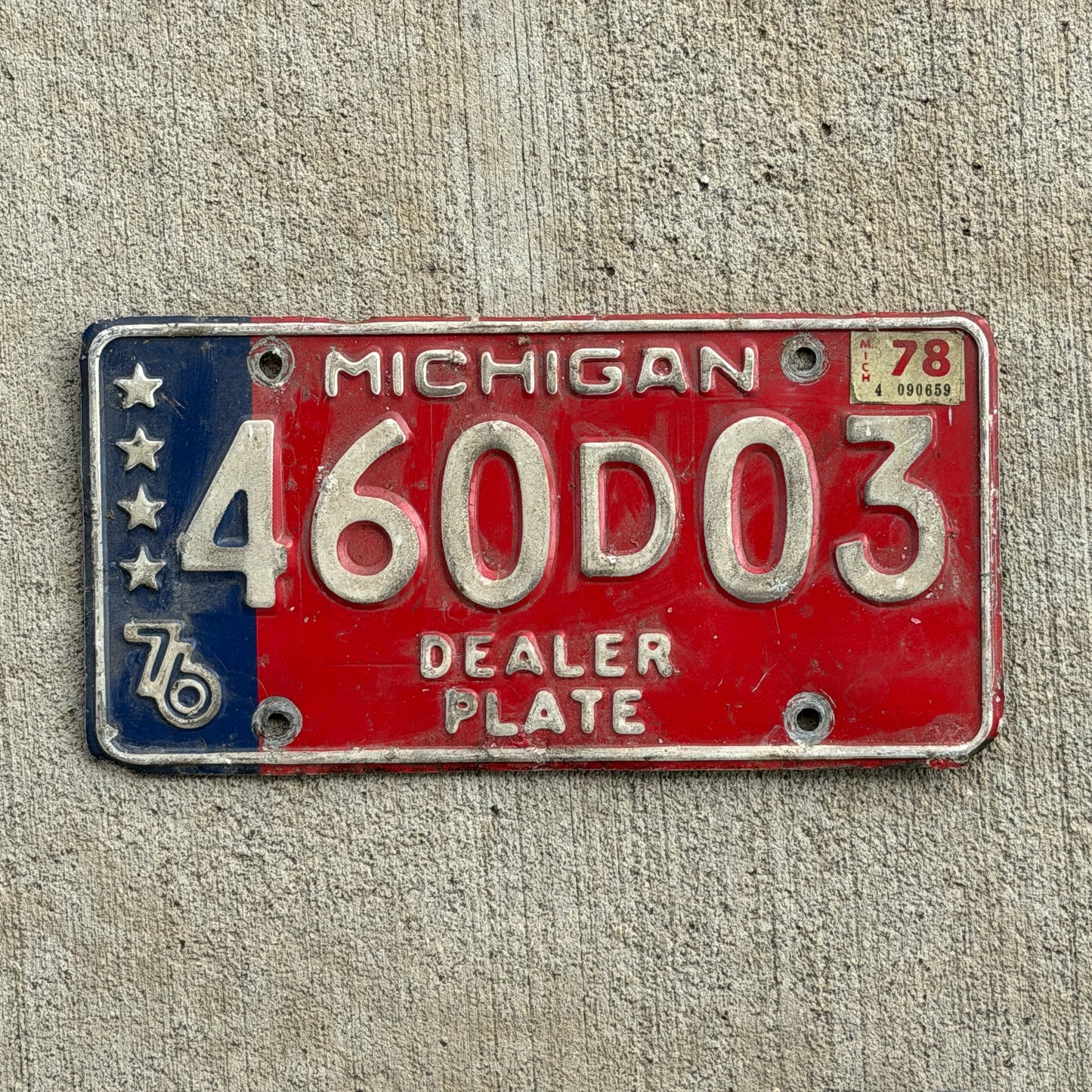 Photo of a 1976 1978 Michigan Dealer License Plate Auto Tag Garage Decor Vintage Bicentennial 460 D 03 with original patina