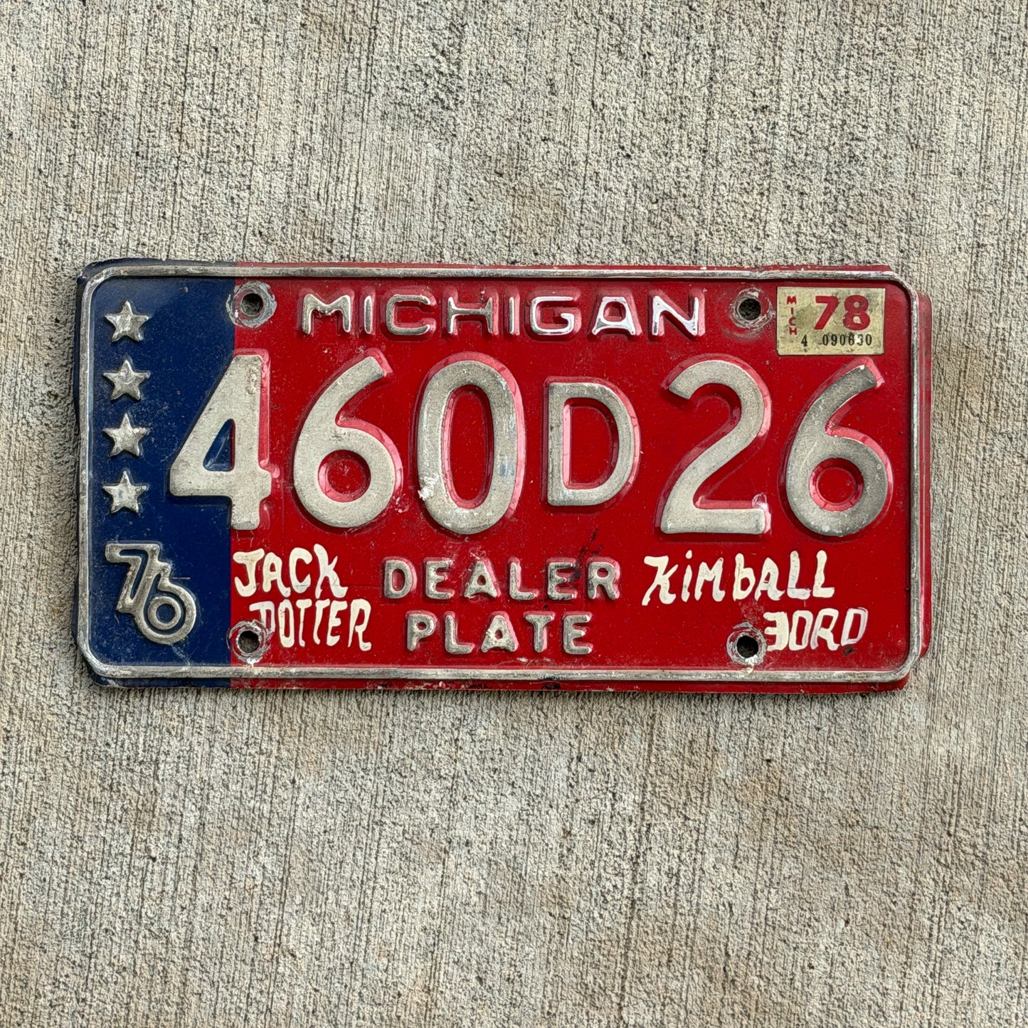 Photo of a 1976 1978 Michigan Dealer License Plate Auto Tag Garage Decor Vintage Bicentennial 460 D 26 with original patina