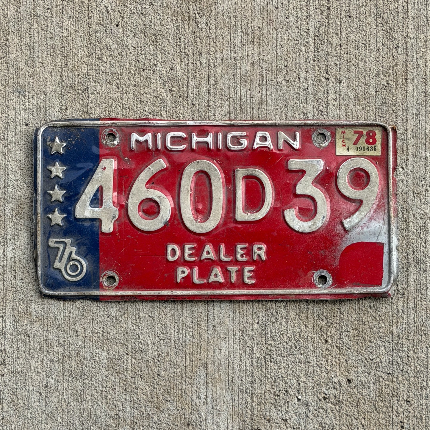 Photo of a 1976 1978 Michigan Dealer License Plate Auto Tag Garage Decor Vintage Bicentennial 460 D 39 with original patina