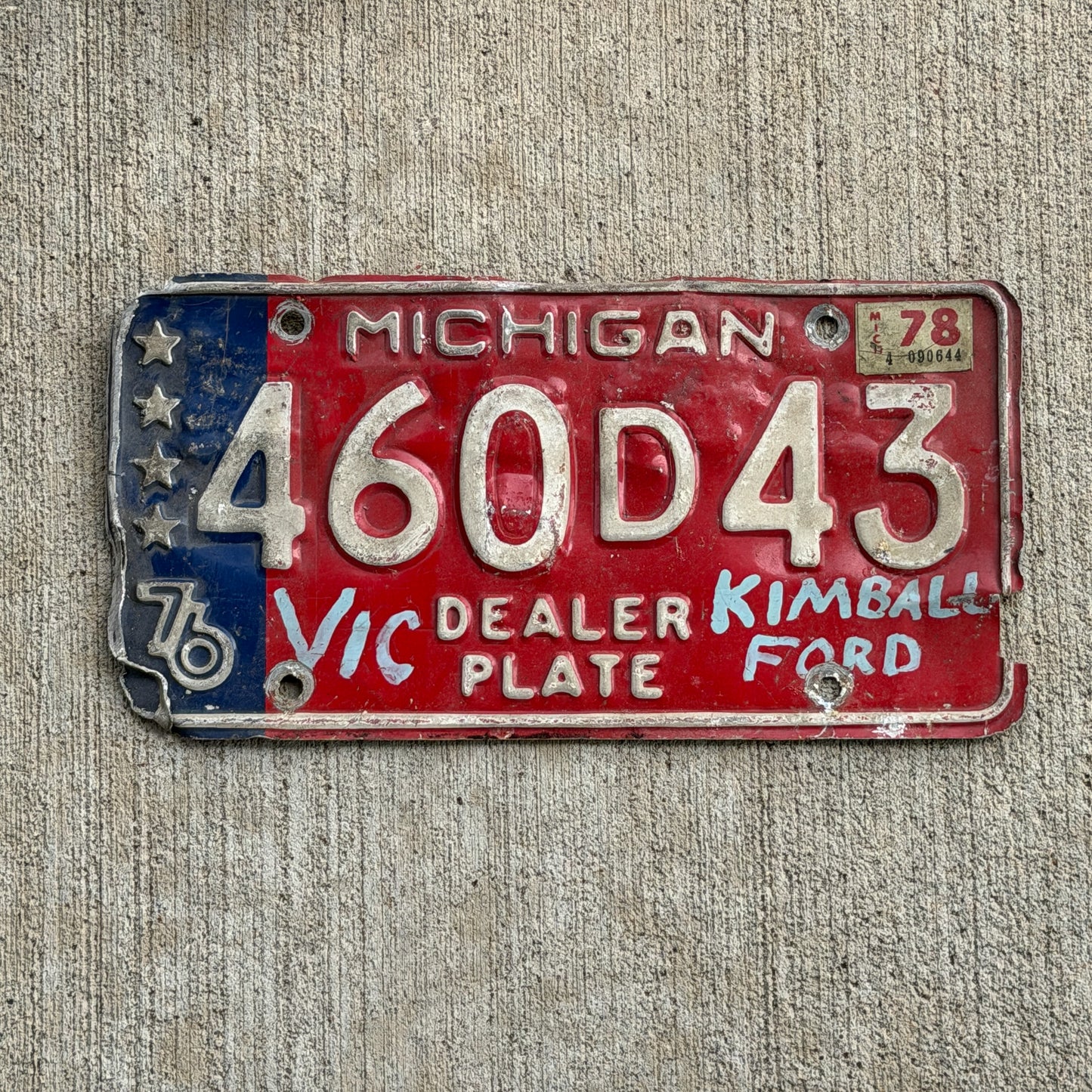 Photo of a 1976 1978 Michigan Dealer License Plate Auto Tag Garage Decor Vintage Bicentennial 460 D 43 with original patina