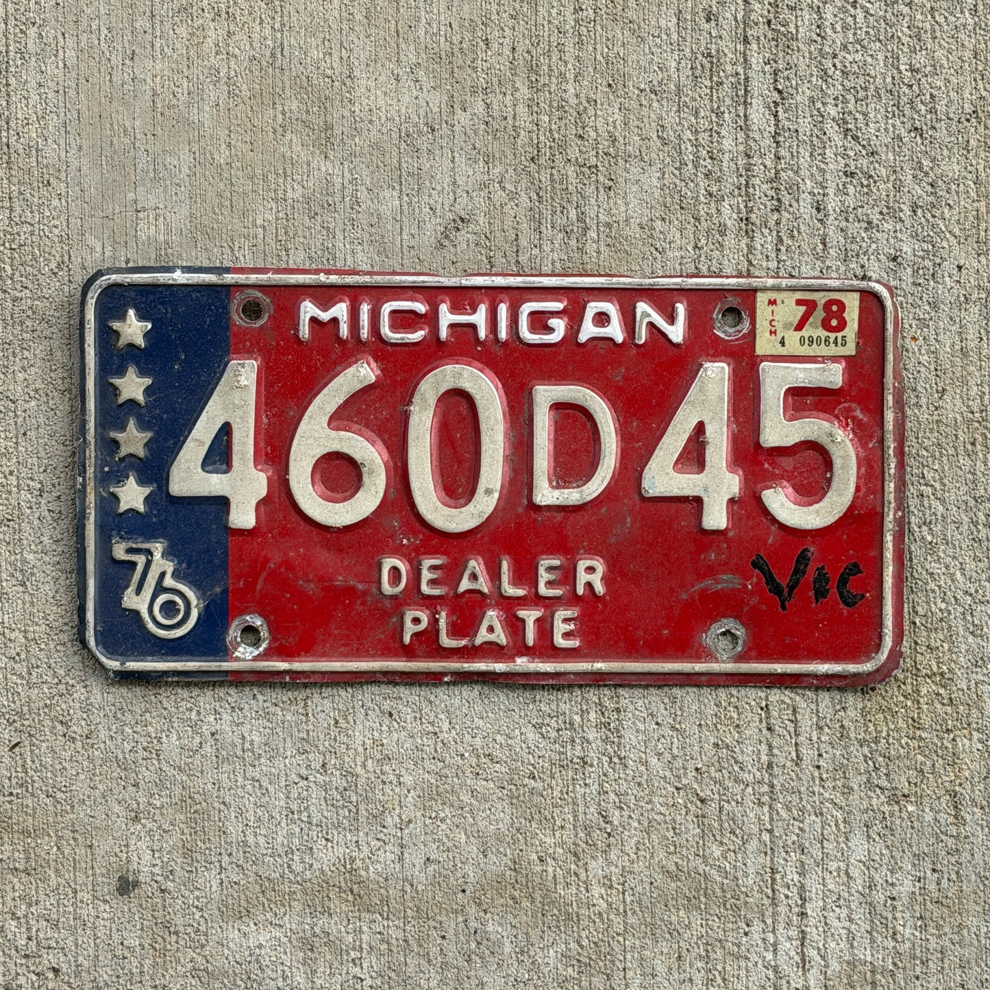 Photo of a 1976 1978 Michigan Dealer License Plate Auto Tag Garage Decor Vintage Bicentennial 460 D 45 with original patina