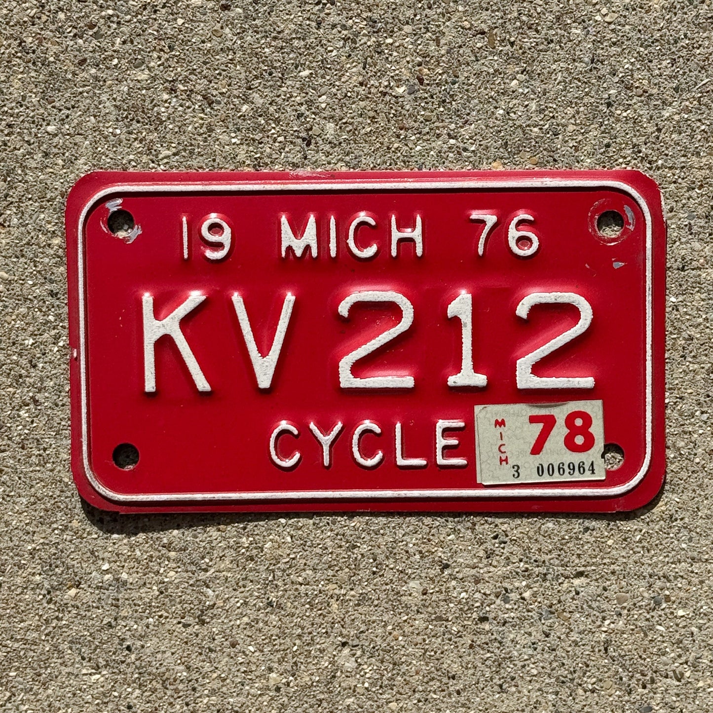 Photo of a 1976 1978 Michigan Motorcycle License Plate Auto Tag Garage Decor Vintage KV 212