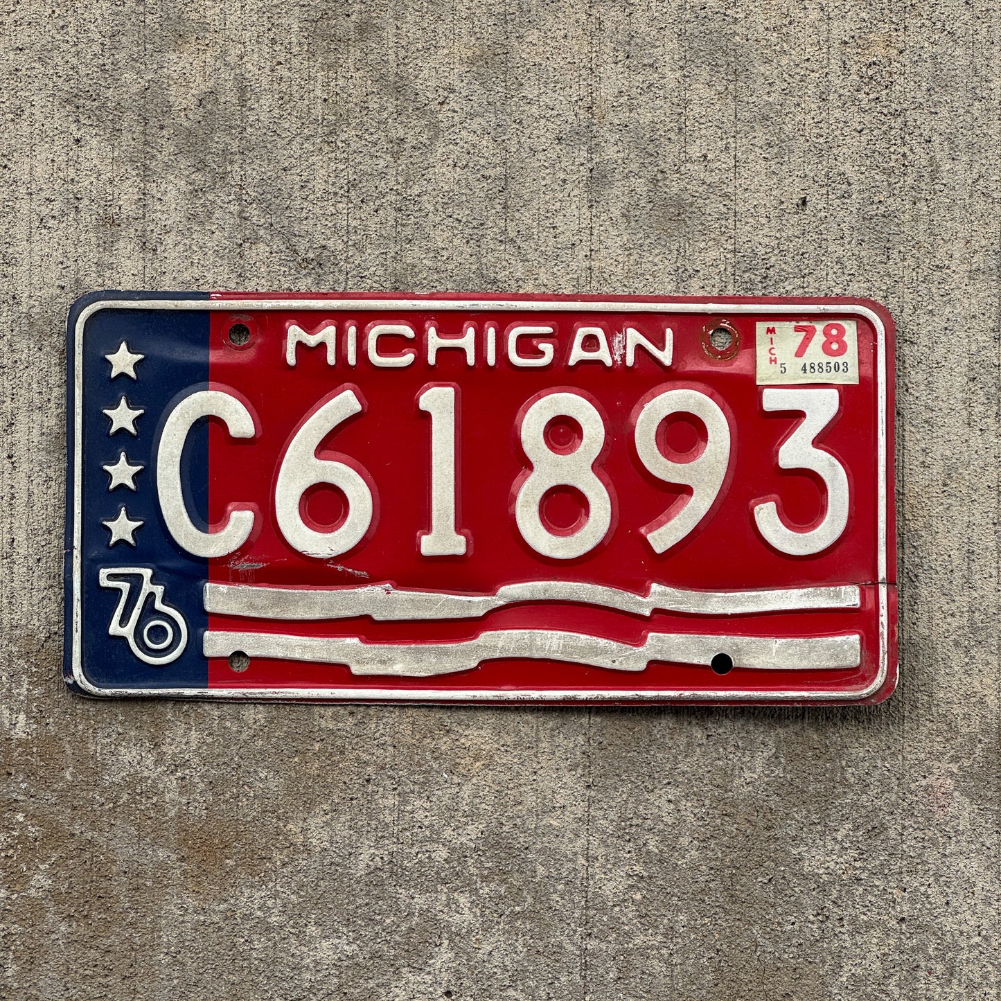 Photo of a 1976 1978 Michigan Trailer License Plate Auto Tag Garage Decor Vintage American Flag Bicentennial C 61893 with original patina