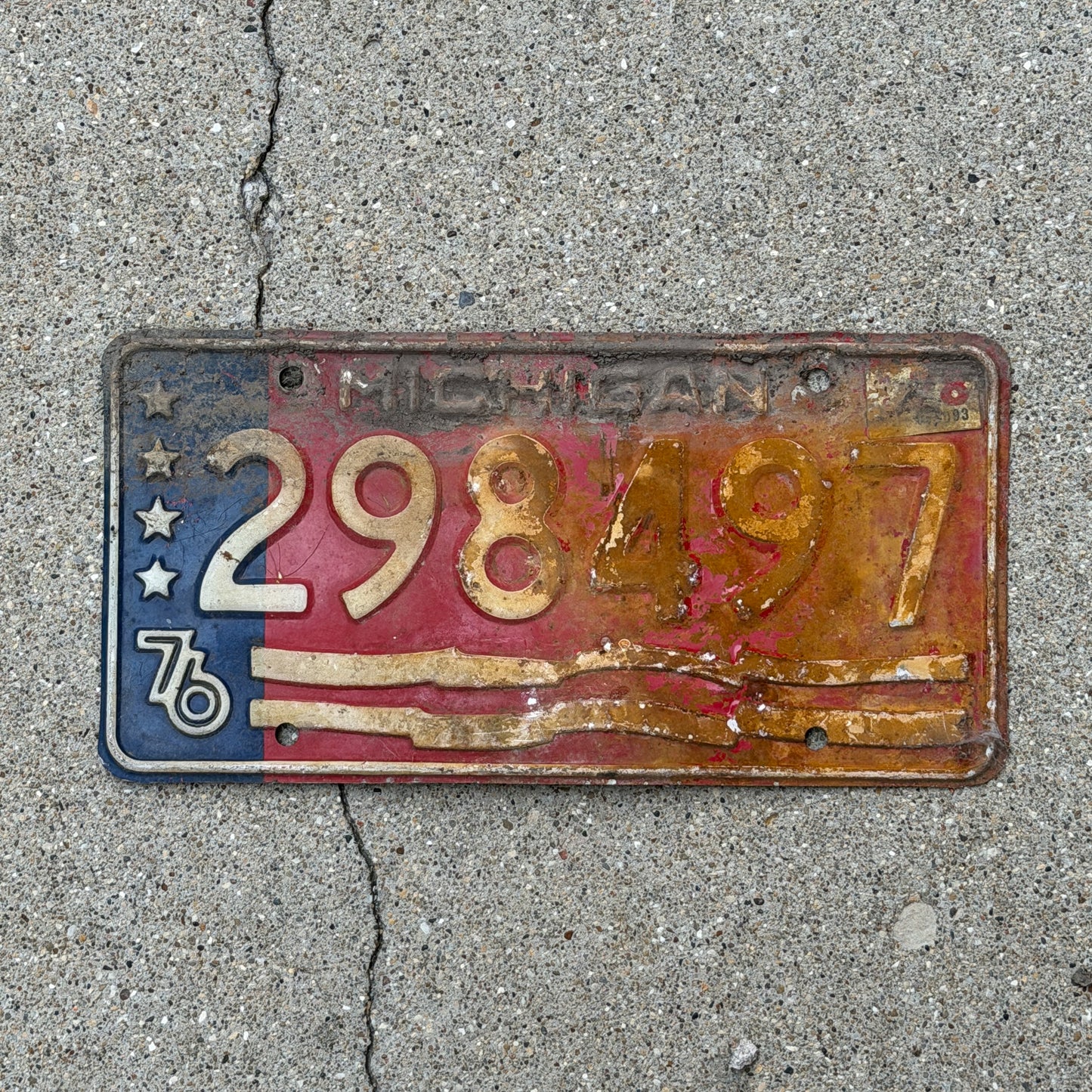 Photo of a 1976 1978 Michigan Trailer License Plate Auto Tag Garage Decor Vintage Bicentennial 298 497 with original patina