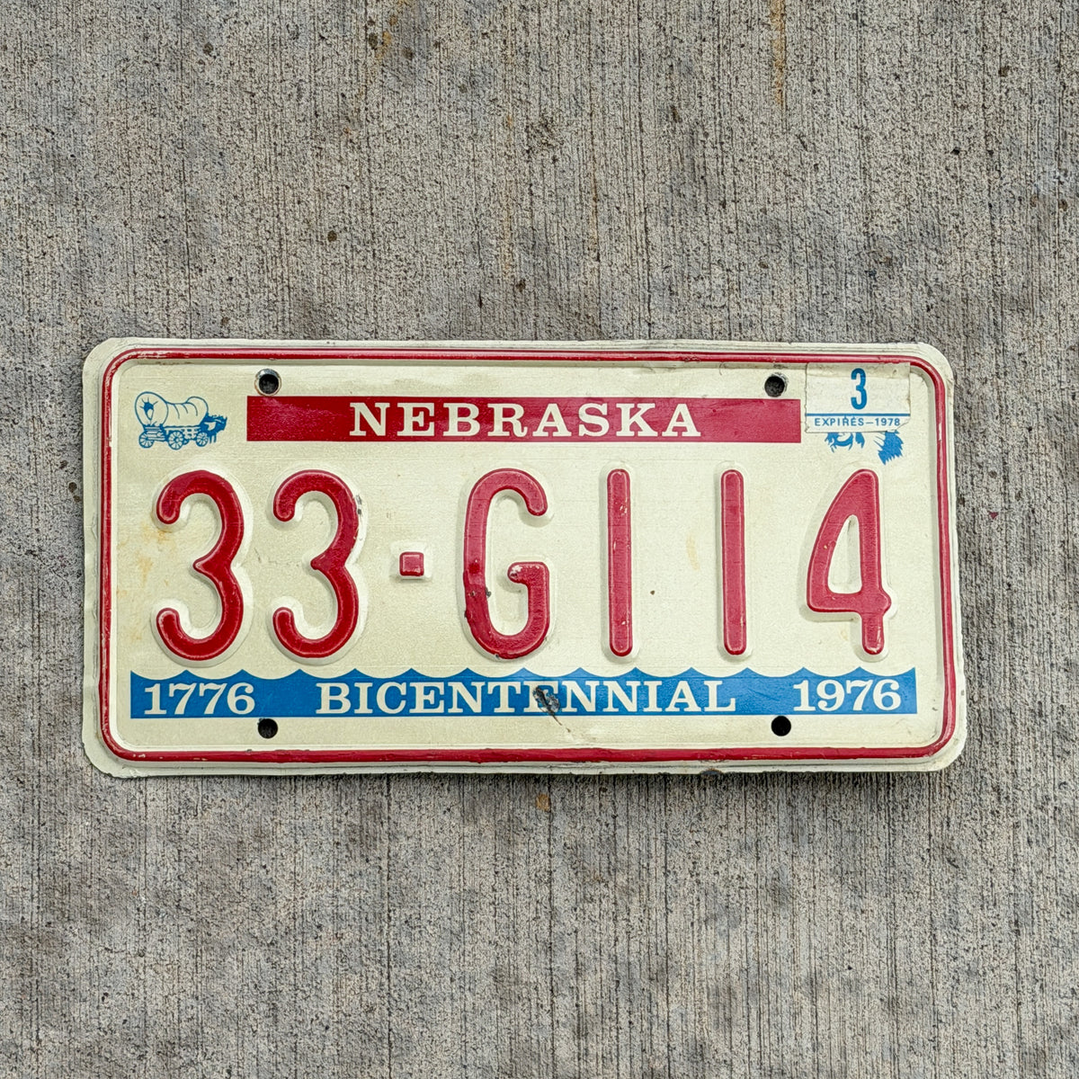 Photo of a 1976 1978 Nebraska License Plate Auto Tag Garage Decor Vintage Bicentennial 33 G114 with original patina