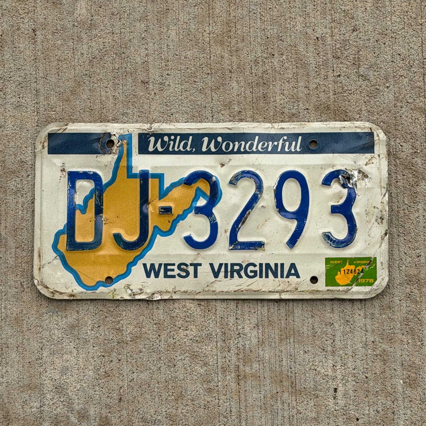 Photo of a 1976 1978 West Virginia License Plate Auto Tag Garage Decor Vintage DJ 3293 with original patina