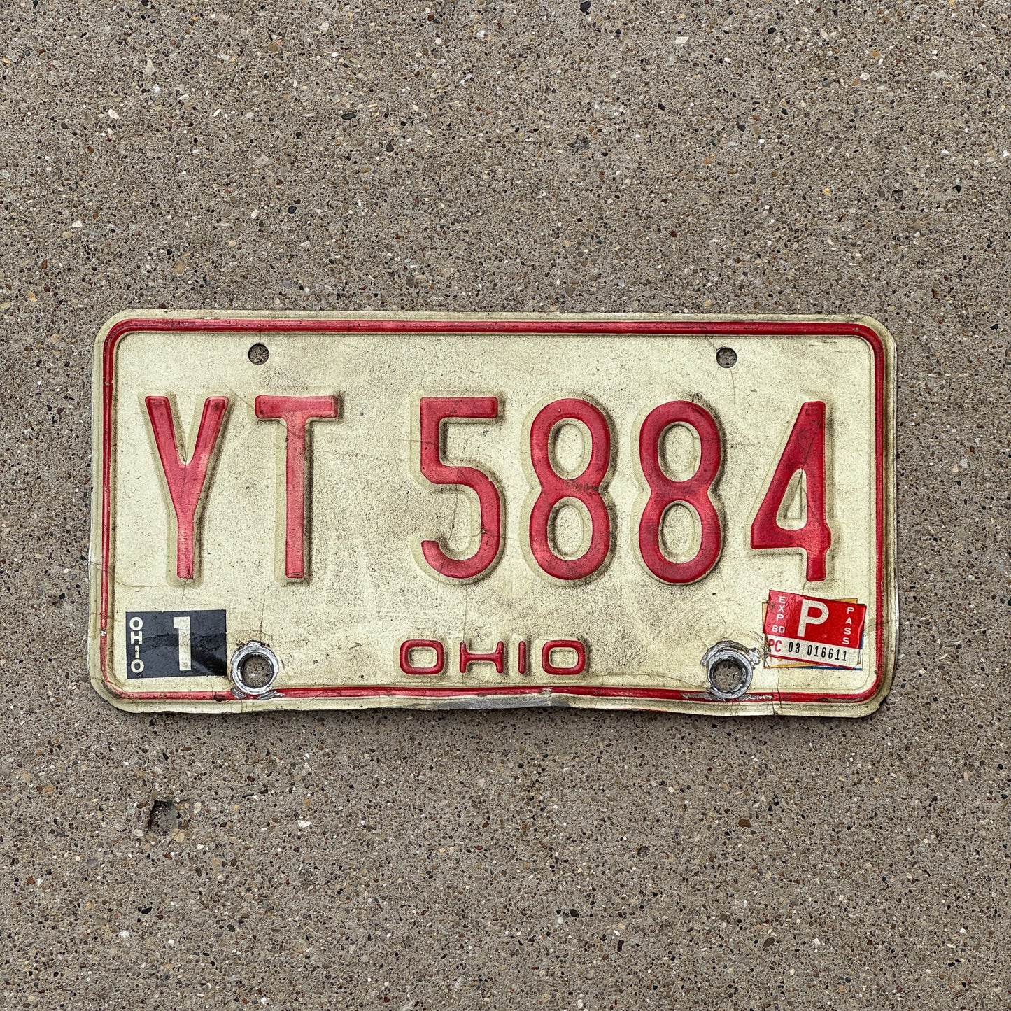 Photo of a 1976 1980 Ohio License Plate Auto Tag 1 Vintage Garage YT 5884 with original patina