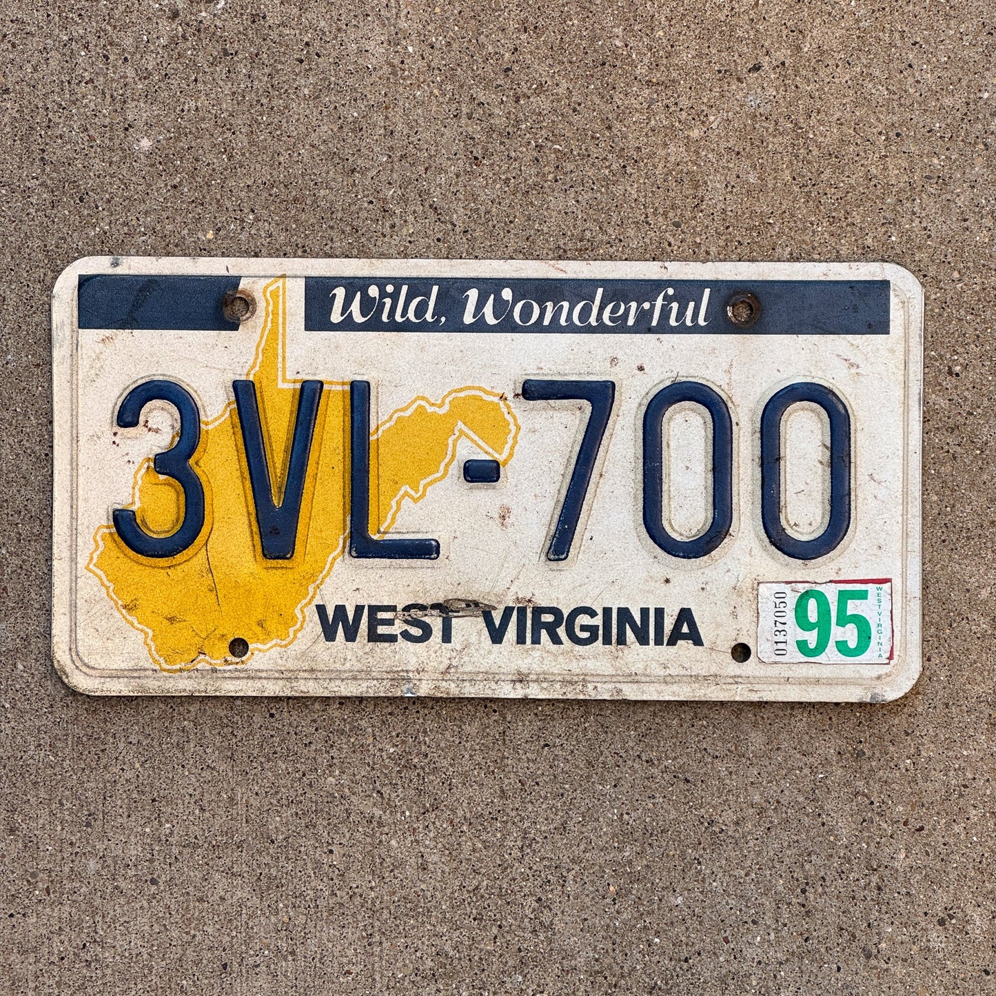 Photo of a 1976 1995 West Virginia License Plate Auto Tag Garage Decor Vintage 3VL 700 with original patina