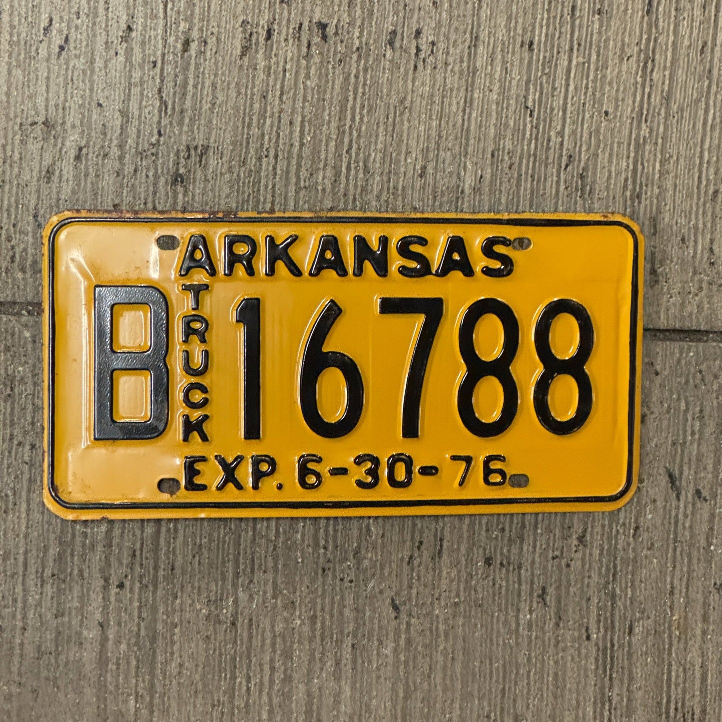 Photo of a 1976 Arkansas Truck License Plate Auto Tag Garage Decor Vintage B 16788