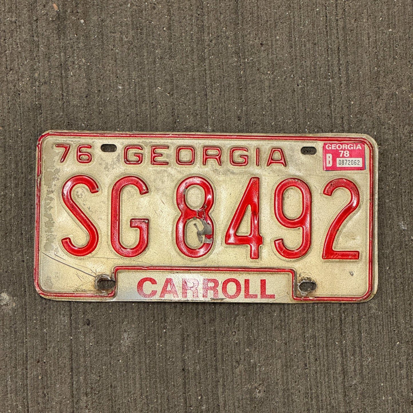 Photo of a 1976 Georgia License Plate Auto Tag Garage Decor Vintage Carroll County SG 8492
