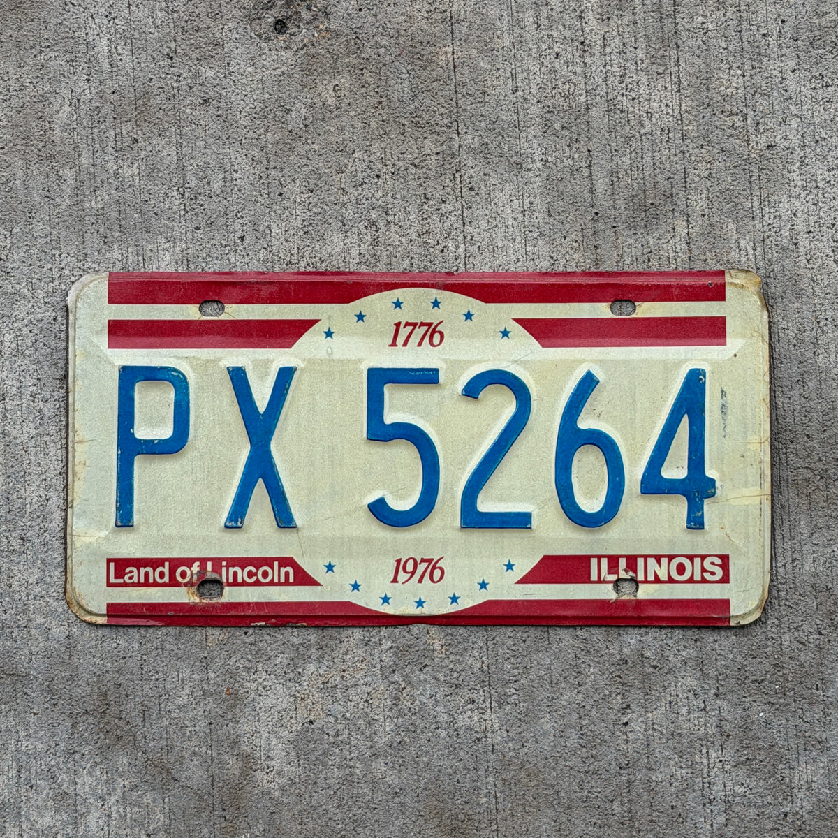 Photo of a 1976 Illinois License Plate Auto Tag Garage Decor Vintage Bicentennial PX 5264 with original patina