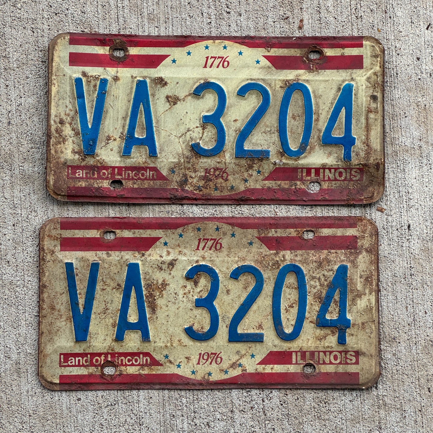 Photo of a 1976 Illinois License Plate Pair Auto Tag Garage Decor Vintage Bicentennial VA 3204 with original patina