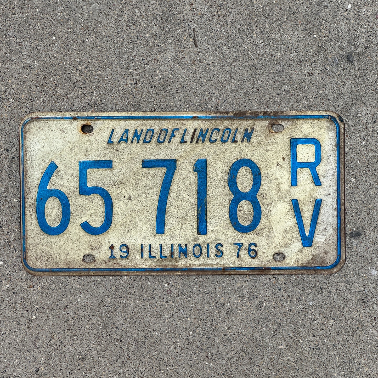 Photo of a 1976 Illinois RV License Plate Auto Tag 1 Vintage Garage 65 718 with original patina