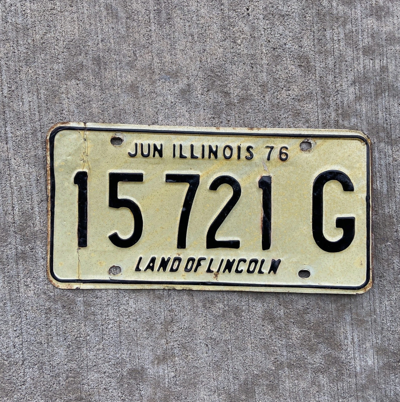 Photo of a 1976 Illinois Truck License Plate Auto Tag Garage Decor Vintage 15721 G with original patina