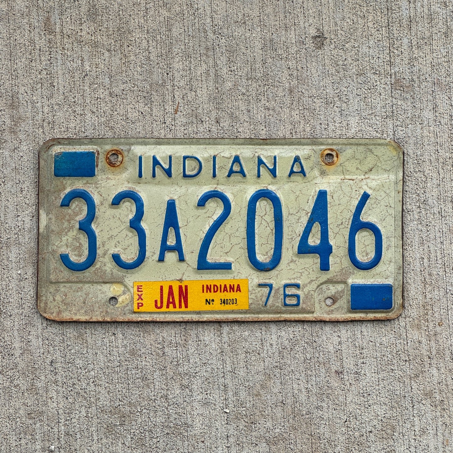 Photo of a 1976 Indiana License Plate Auto Tag Garage Decor Vintage 33 A 2046 with original patina