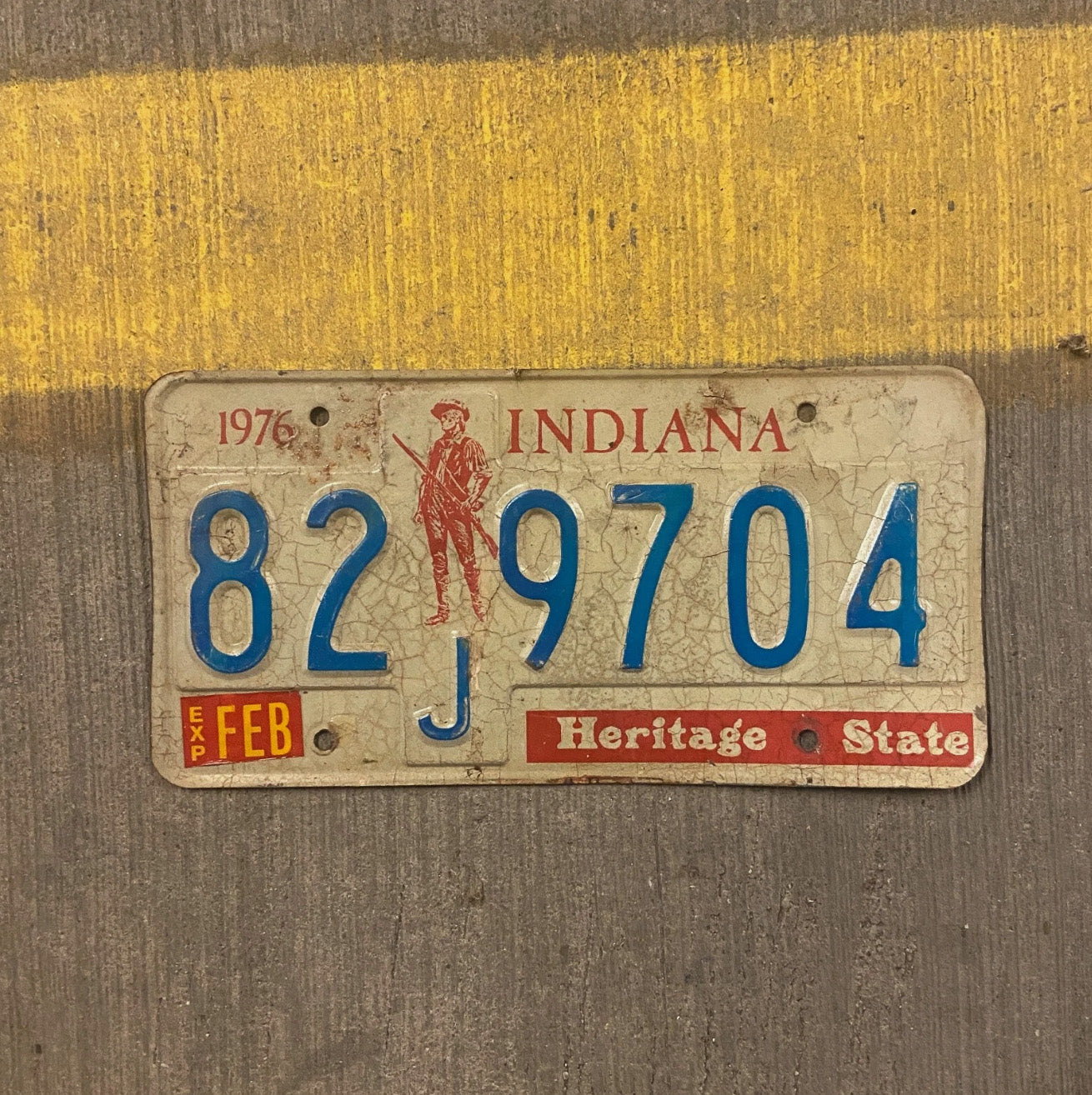 Photo of a 1976 Indiana License Plate Auto Tag Garage Decor Vintage 82 J 9704