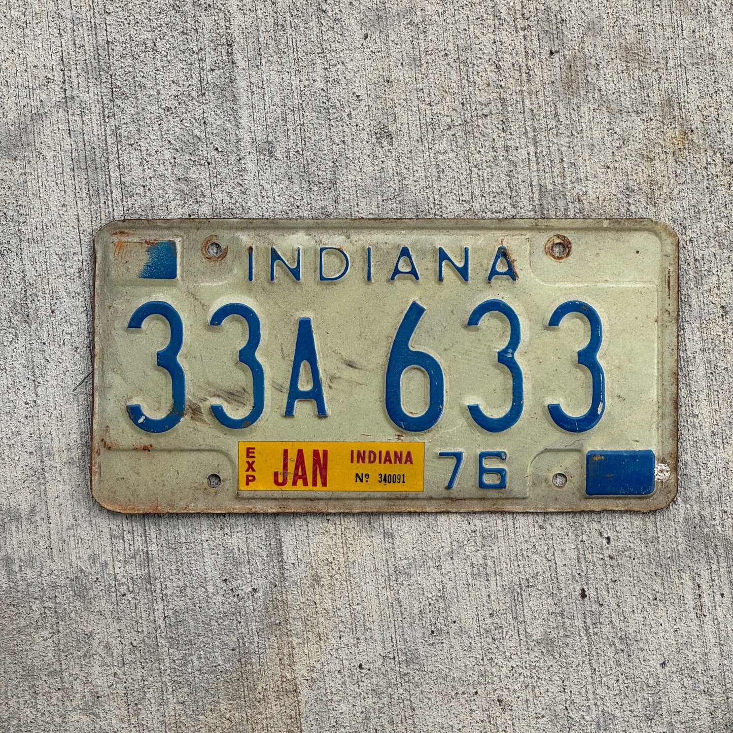 Photo of a 1976 Indiana License Plate Auto Tag Garage Decor Vintage Full House 33 A 633 with original patina